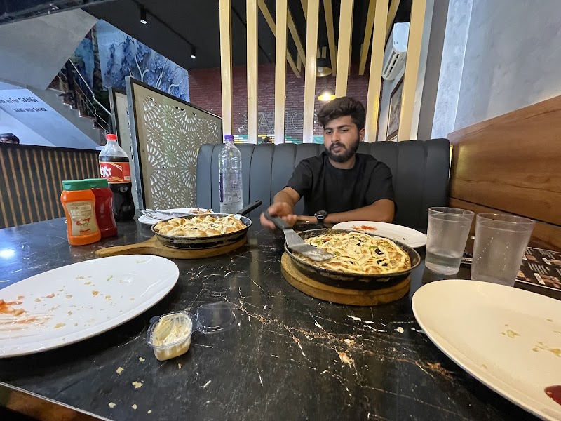 SANGI Pizza and steak world in Okara, Punjab