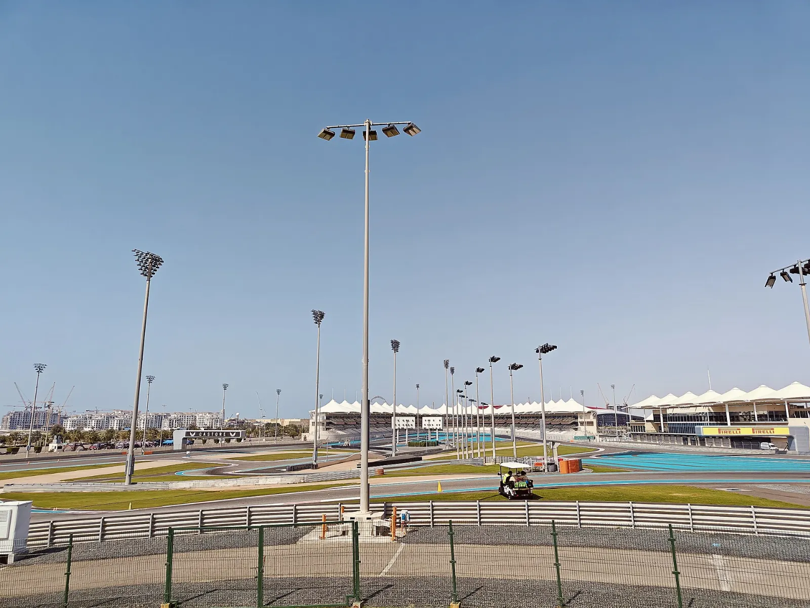 Yas Marina Circuit with its grandstands beside the marina, Abu Dhabi, United Arab Emirates