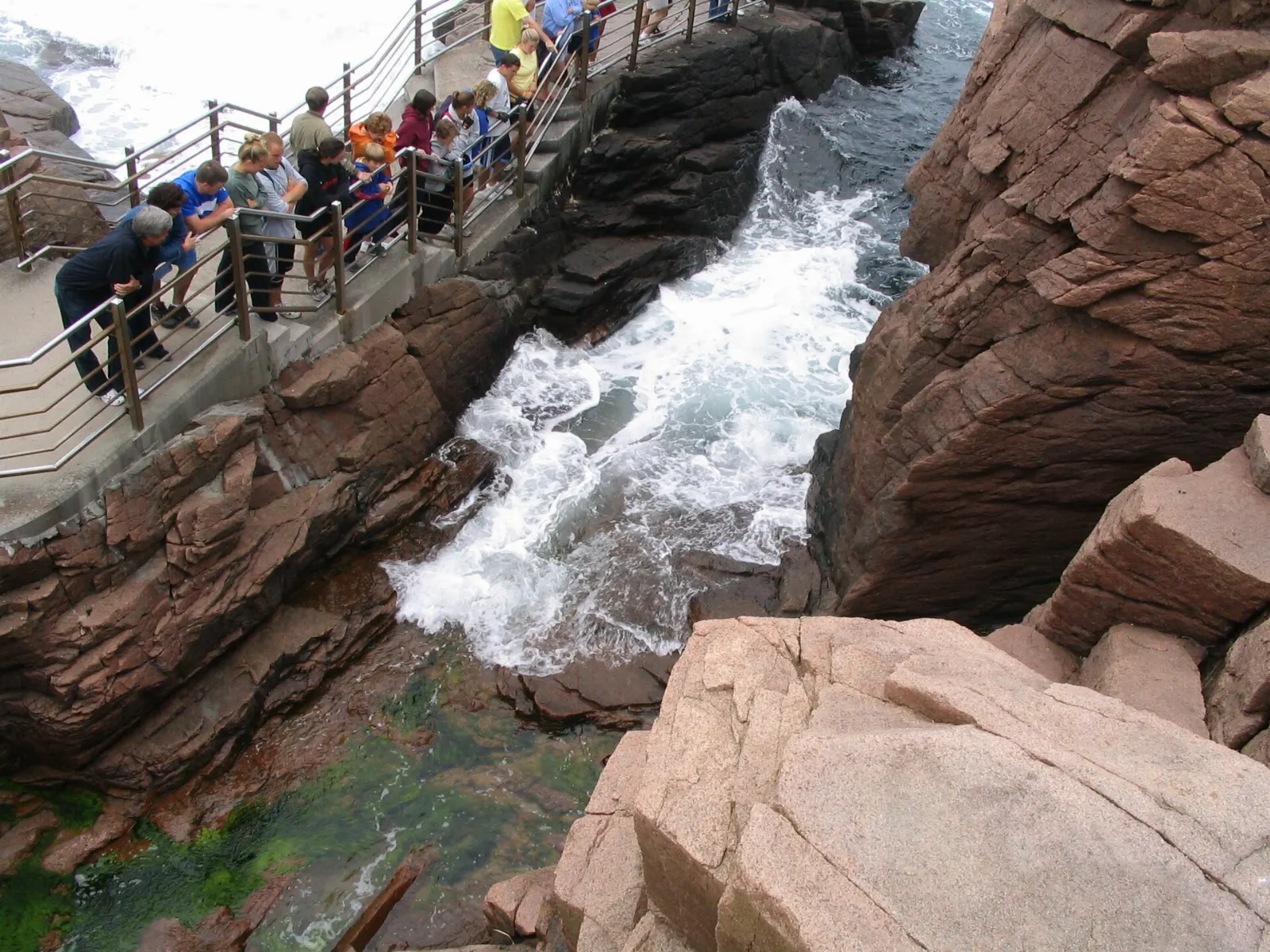 Waves surging into a narrow rock inlet at Thunder Hole, Acadia National Park, Maine