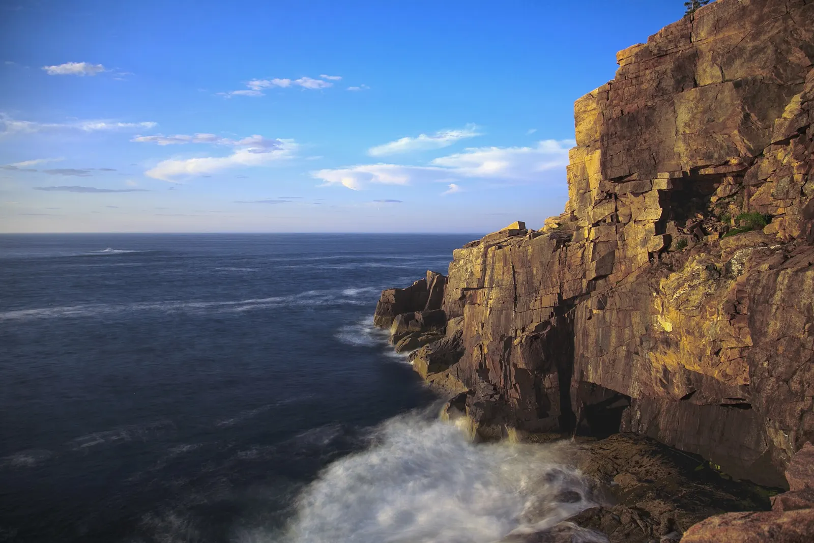 Pink granite cliffs of Otter Cliff dropping straight into the Atlantic, Acadia National Park, Maine