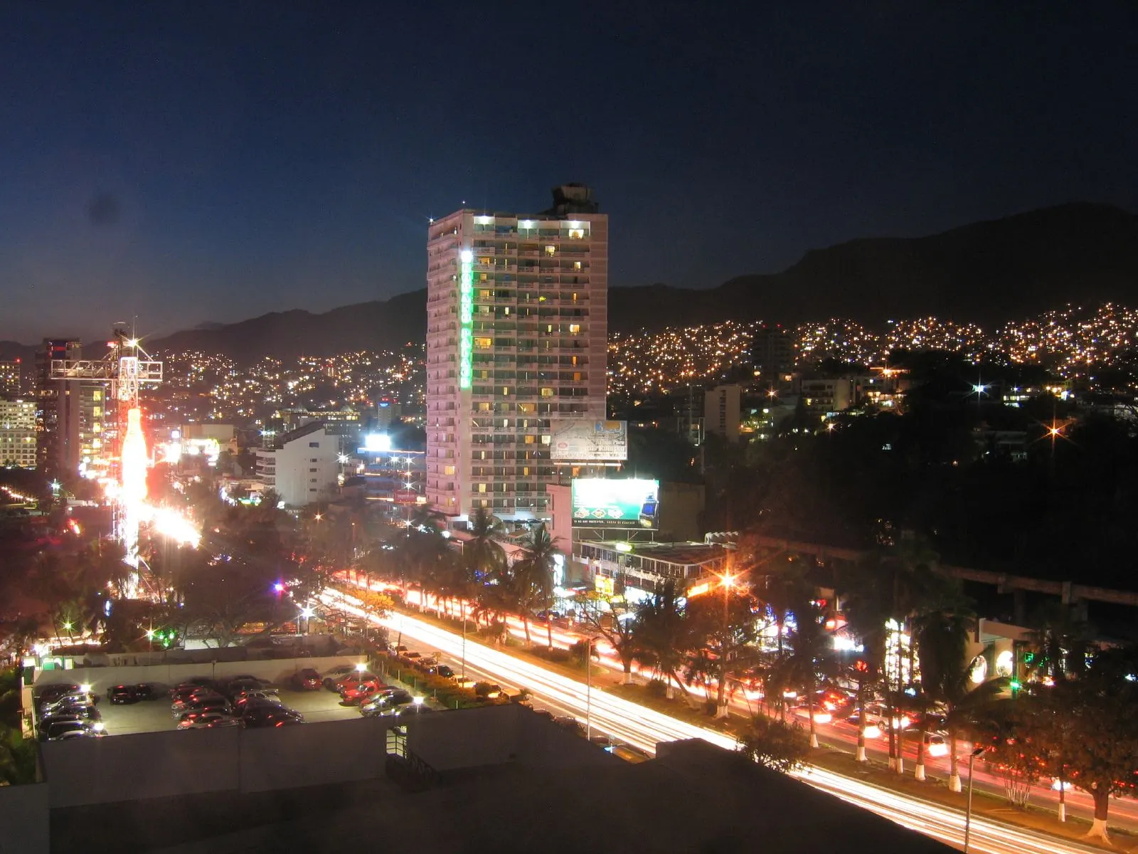 Waterfront avenue and hotels curving around Acapulco bay, Guerrero