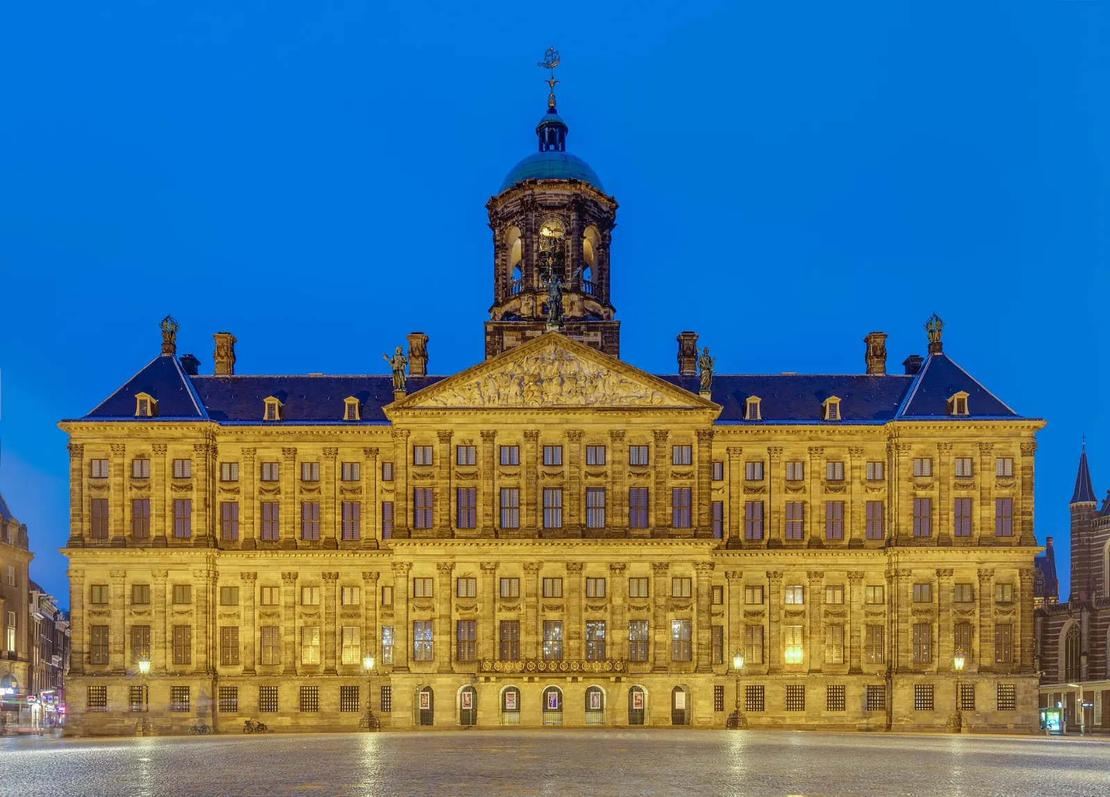 The classical facade of the Royal Palace overlooking Dam Square, Amsterdam, Netherlands