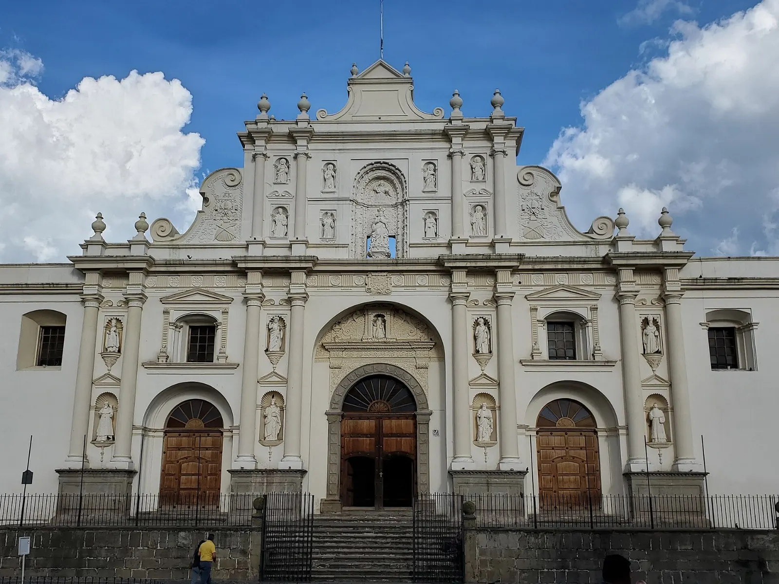 The white baroque facade of Antigua's cathedral facing the central park, Guatemala