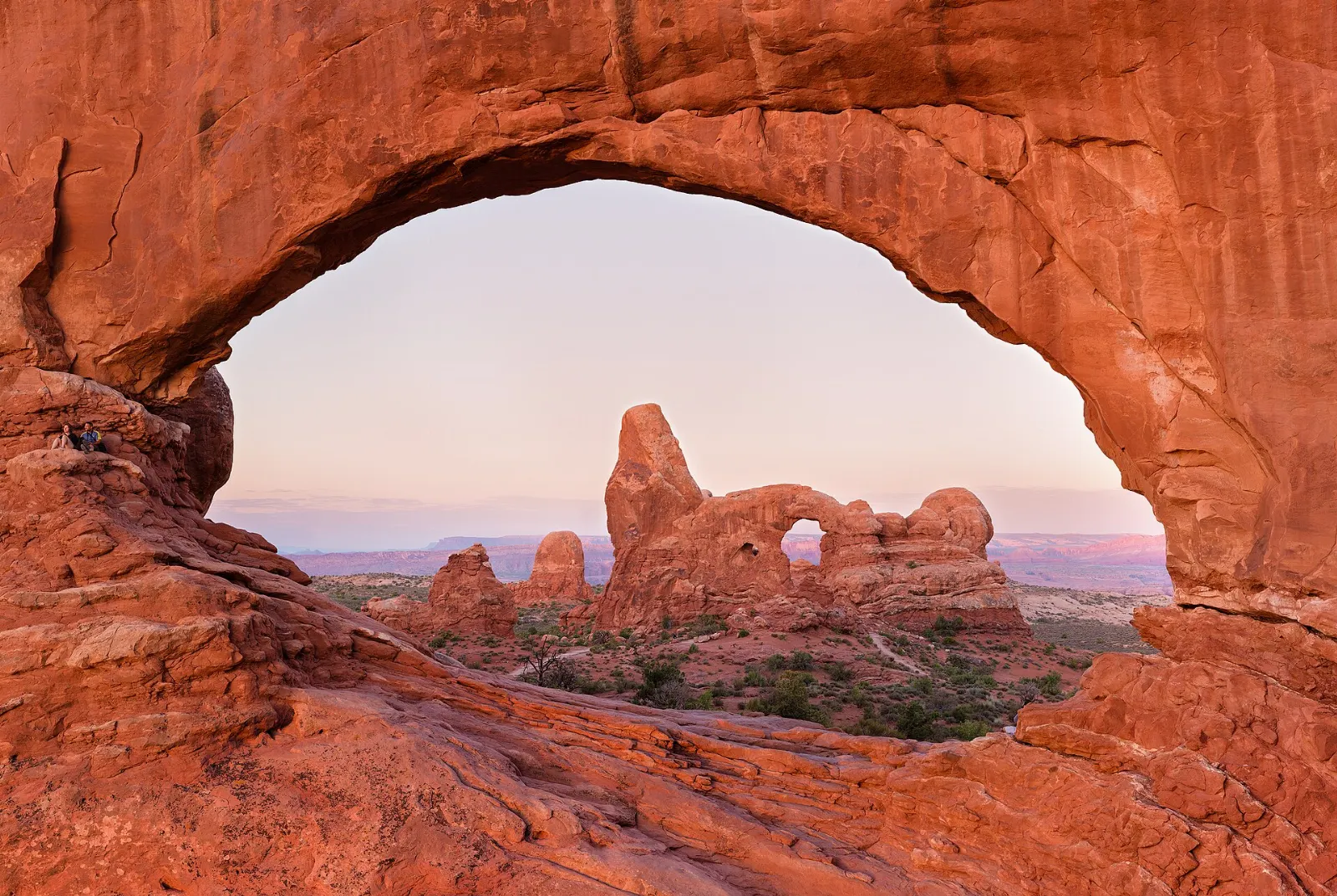 Turret Arch framed through the opening of North Window, Arches National Park, Utah