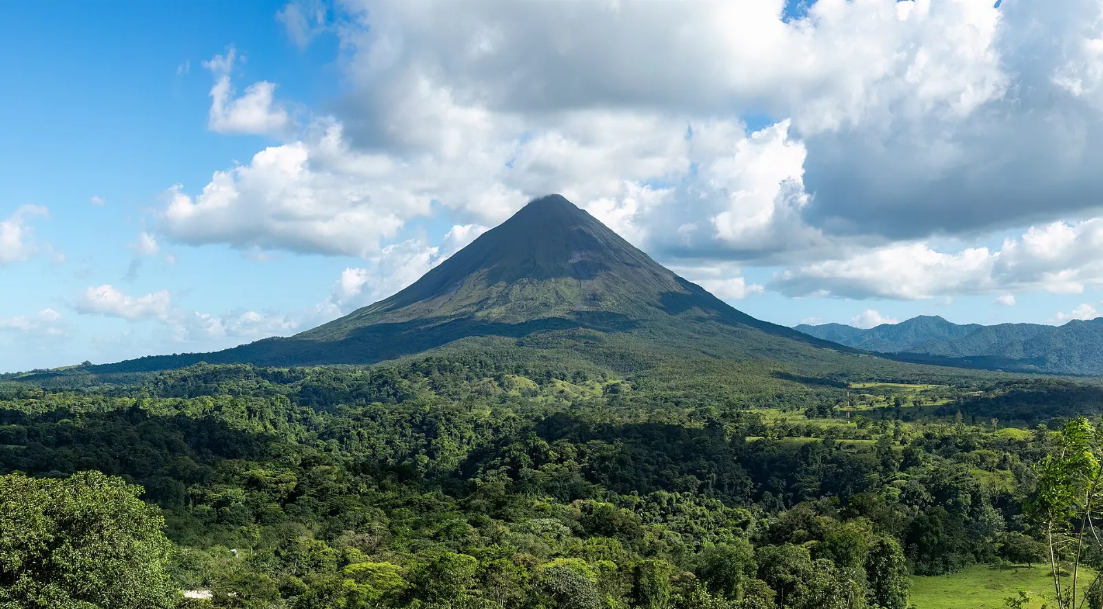 A suspension bridge spanning the rainforest canopy near Arenal, Costa Rica