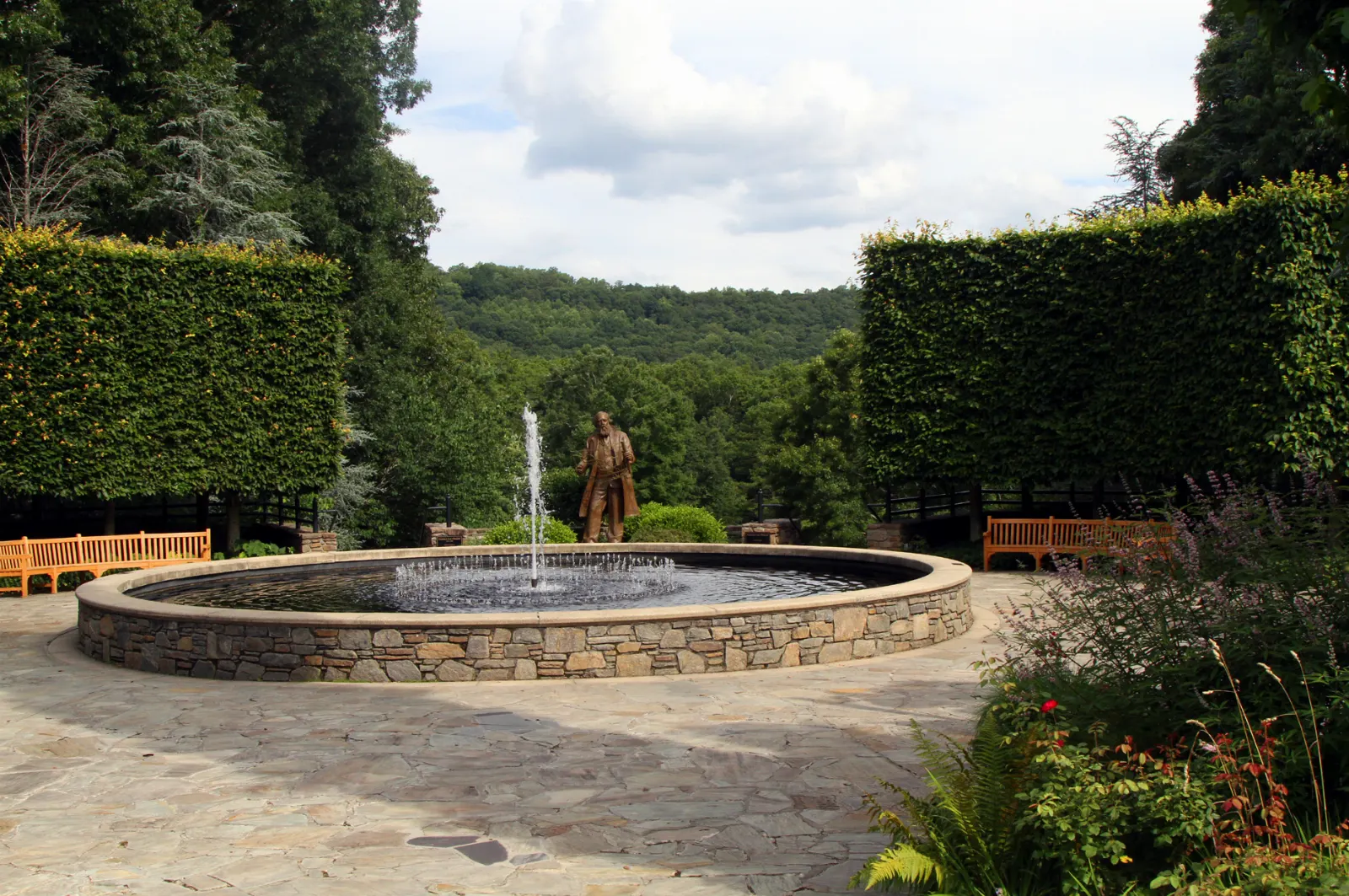 Formal garden with flower beds and stone walls framed by mountains, Asheville, North Carolina