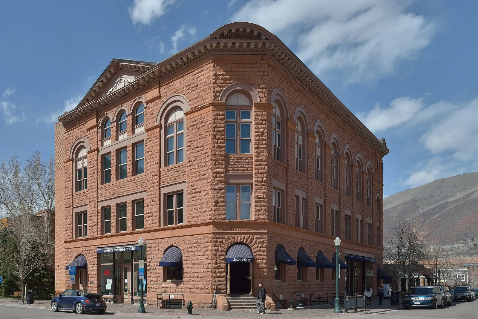 Red sandstone Victorian facade of the Wheeler Opera House in downtown Aspen, Colorado