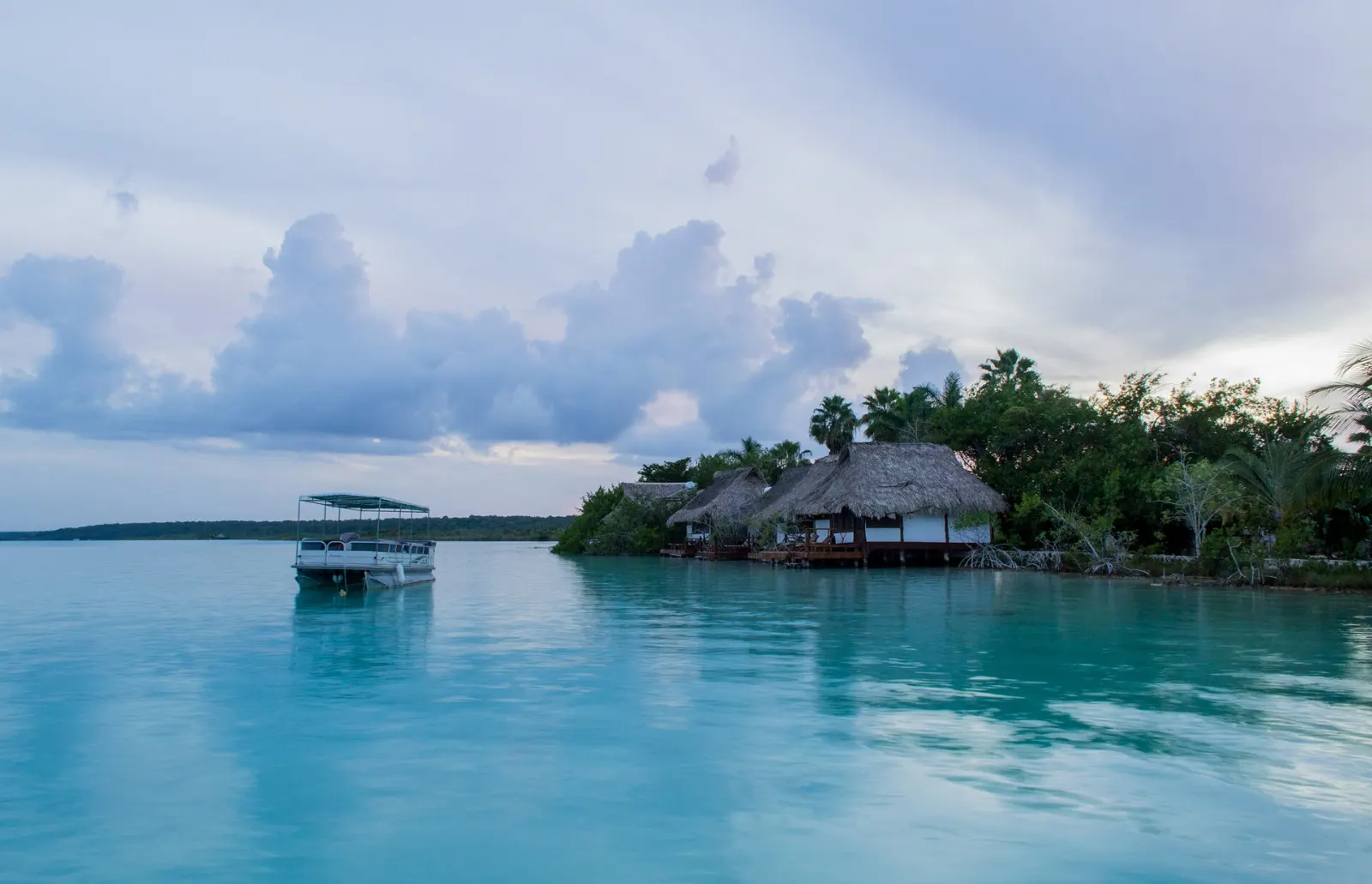 Kayaks on the shallow blue water of Bacalar lagoon, Quintana Roo