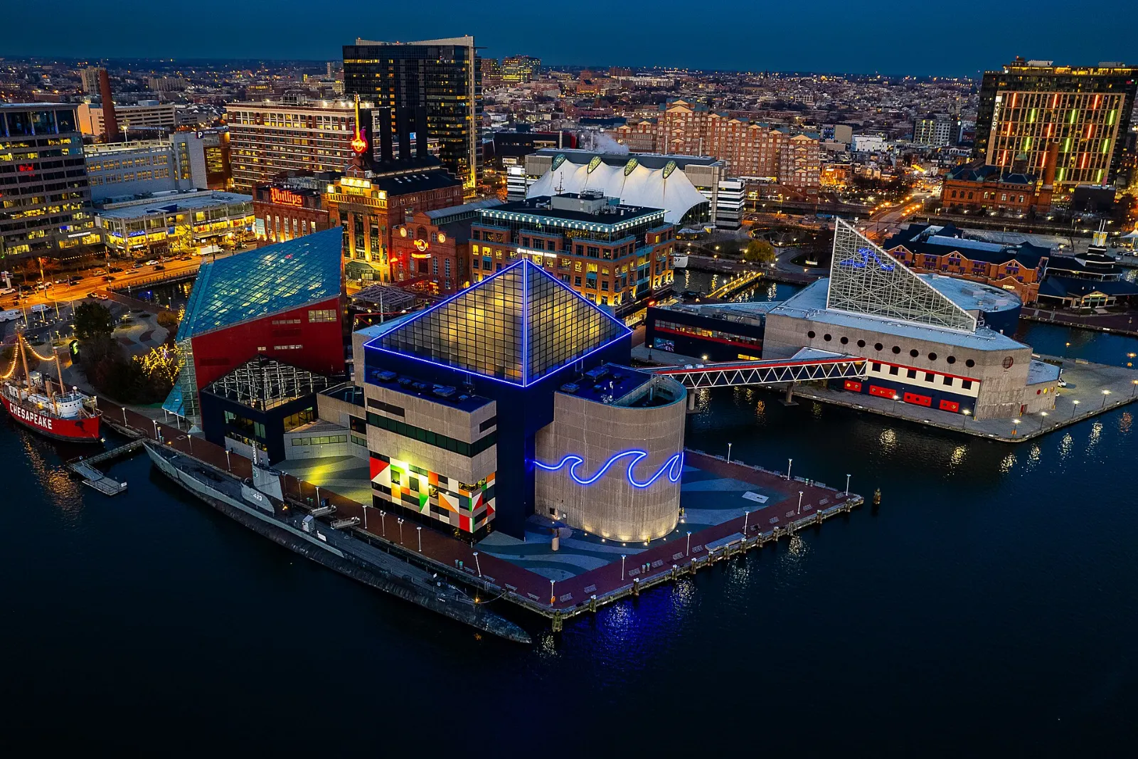 Angular glass-topped building of the National Aquarium on Pier 3, Baltimore, Maryland