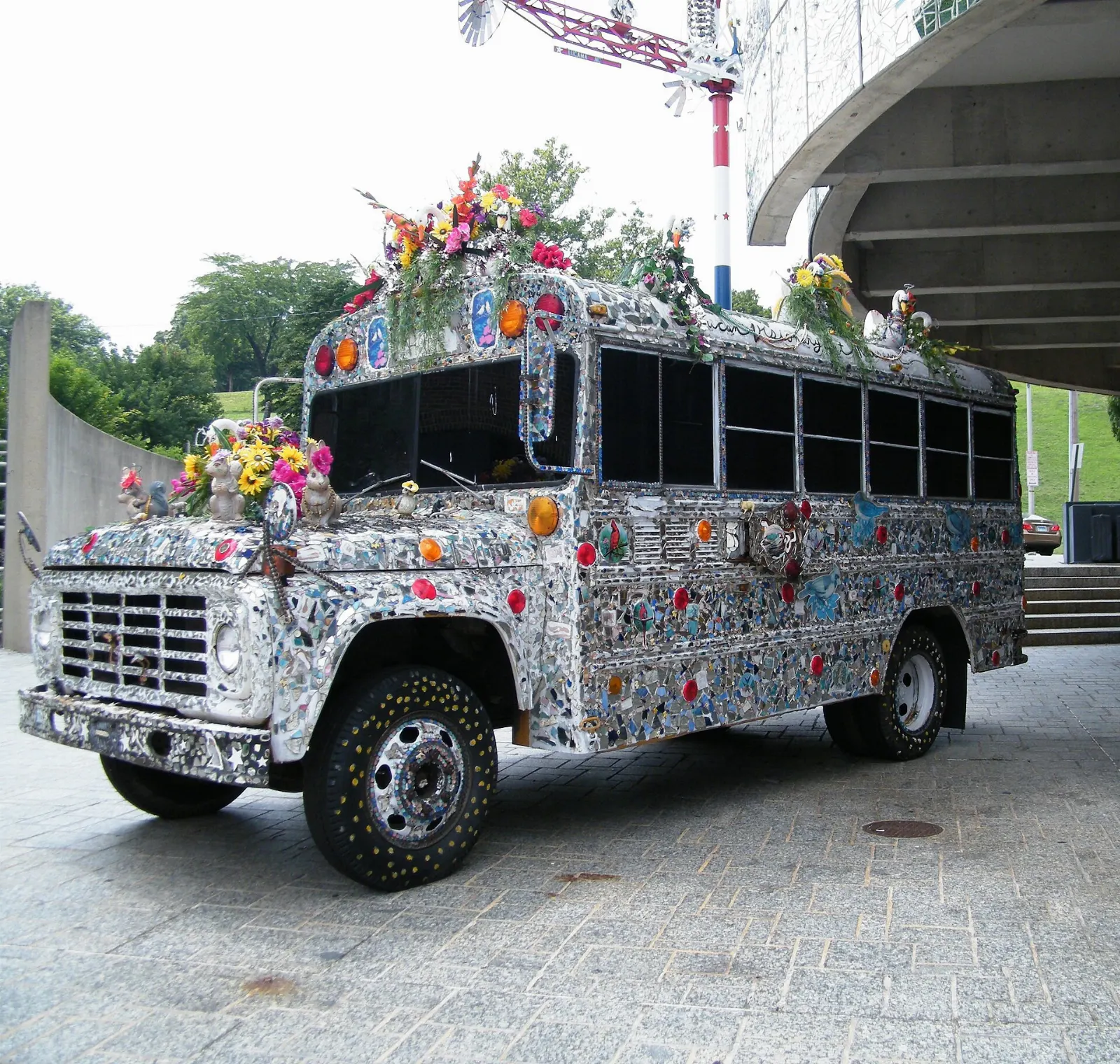 Colorful mosaic-covered exterior and whirligig sculpture at the American Visionary Art Museum, Baltimore, Maryland