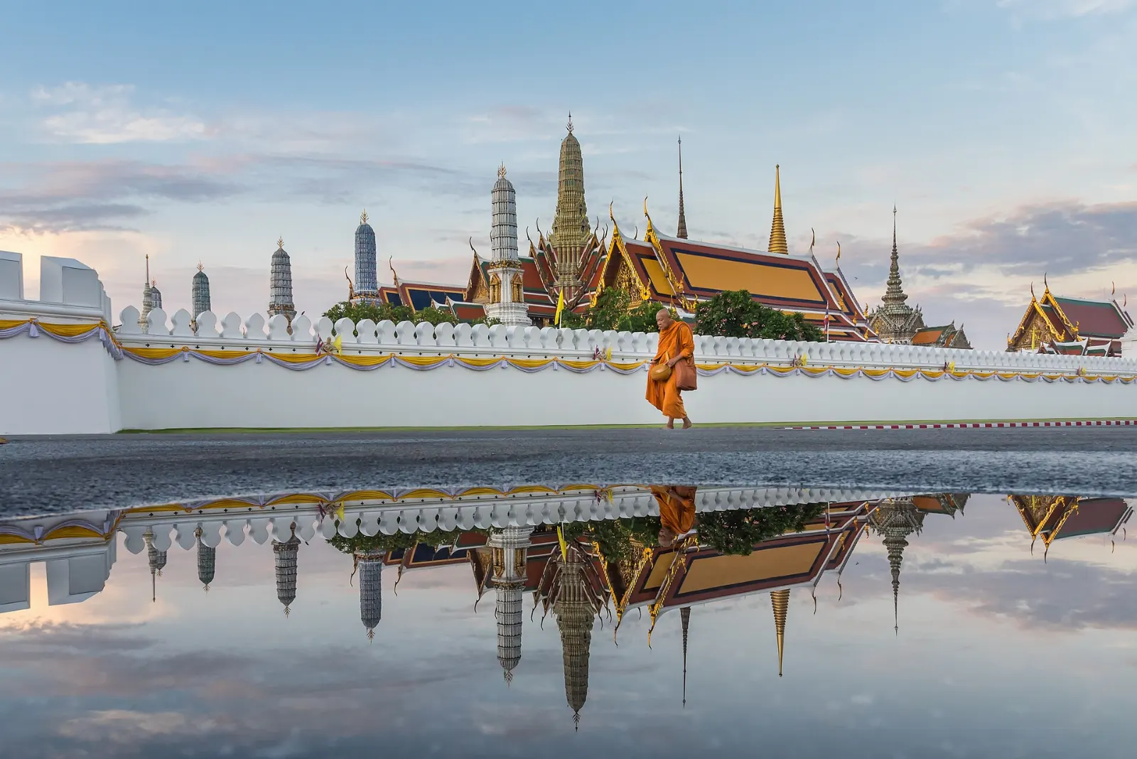 Gilded chedi and ornate temple roofs inside the grounds of Wat Phra Kaew, Bangkok, Thailand