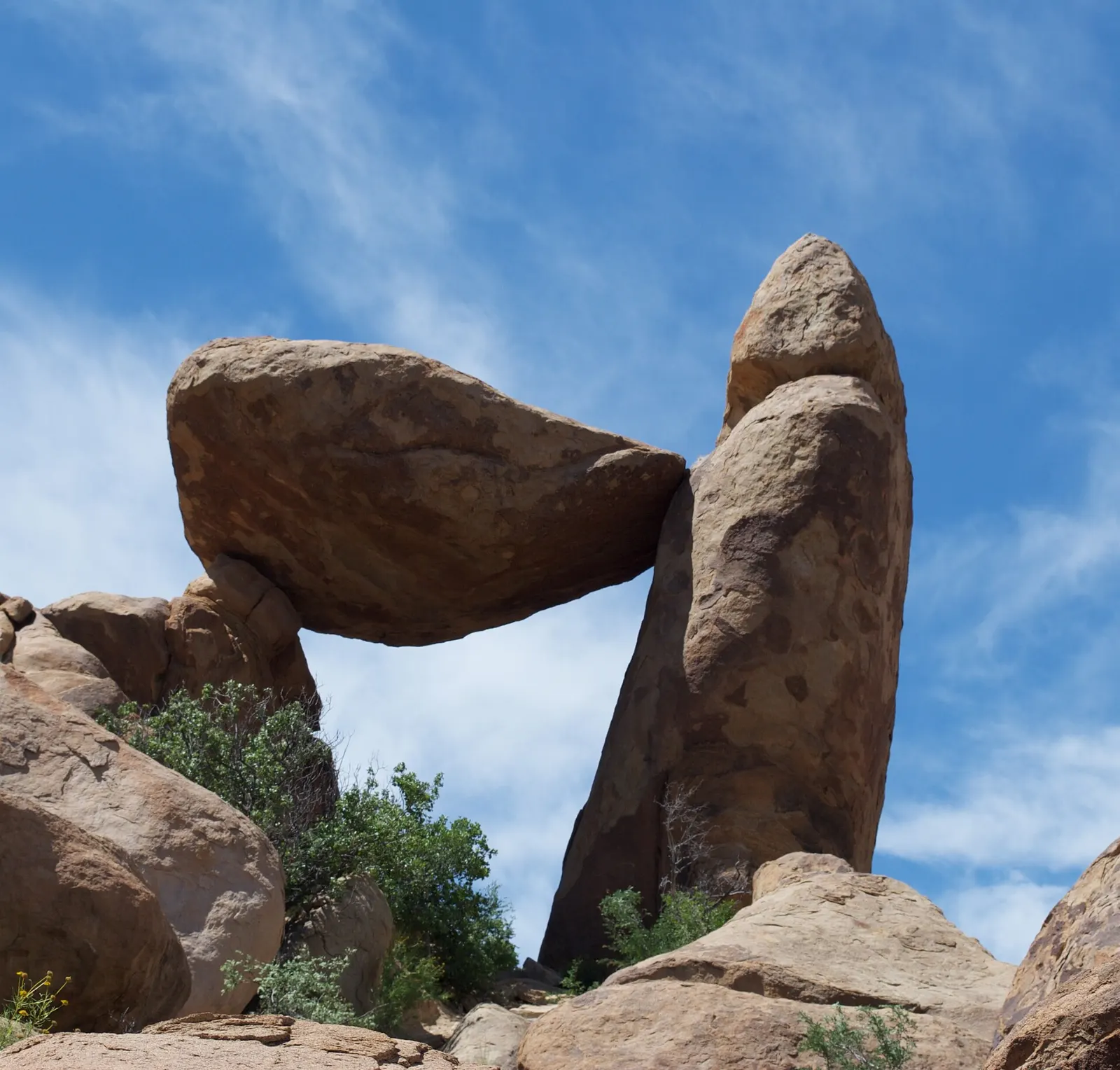Large boulder balanced between two rocks forming a window in the Grapevine Hills, Big Bend National Park, Texas