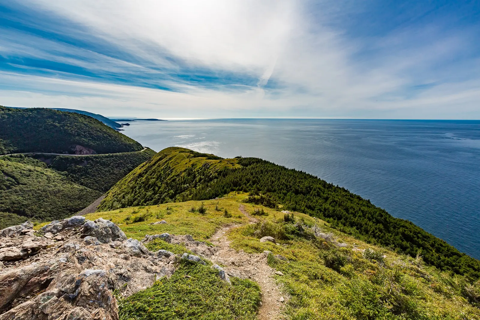 Hikers on the Skyline Trail looking over the coast in Cape Breton Highlands National Park, Cabot Trail, Nova Scotia