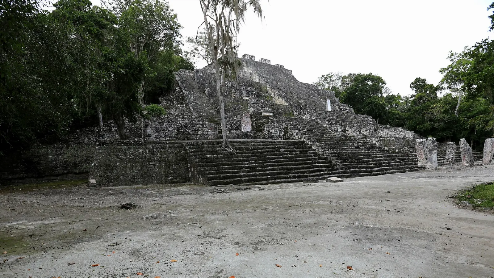 Visitors climbing the stairway of Structure II at Calakmul, Campeche
