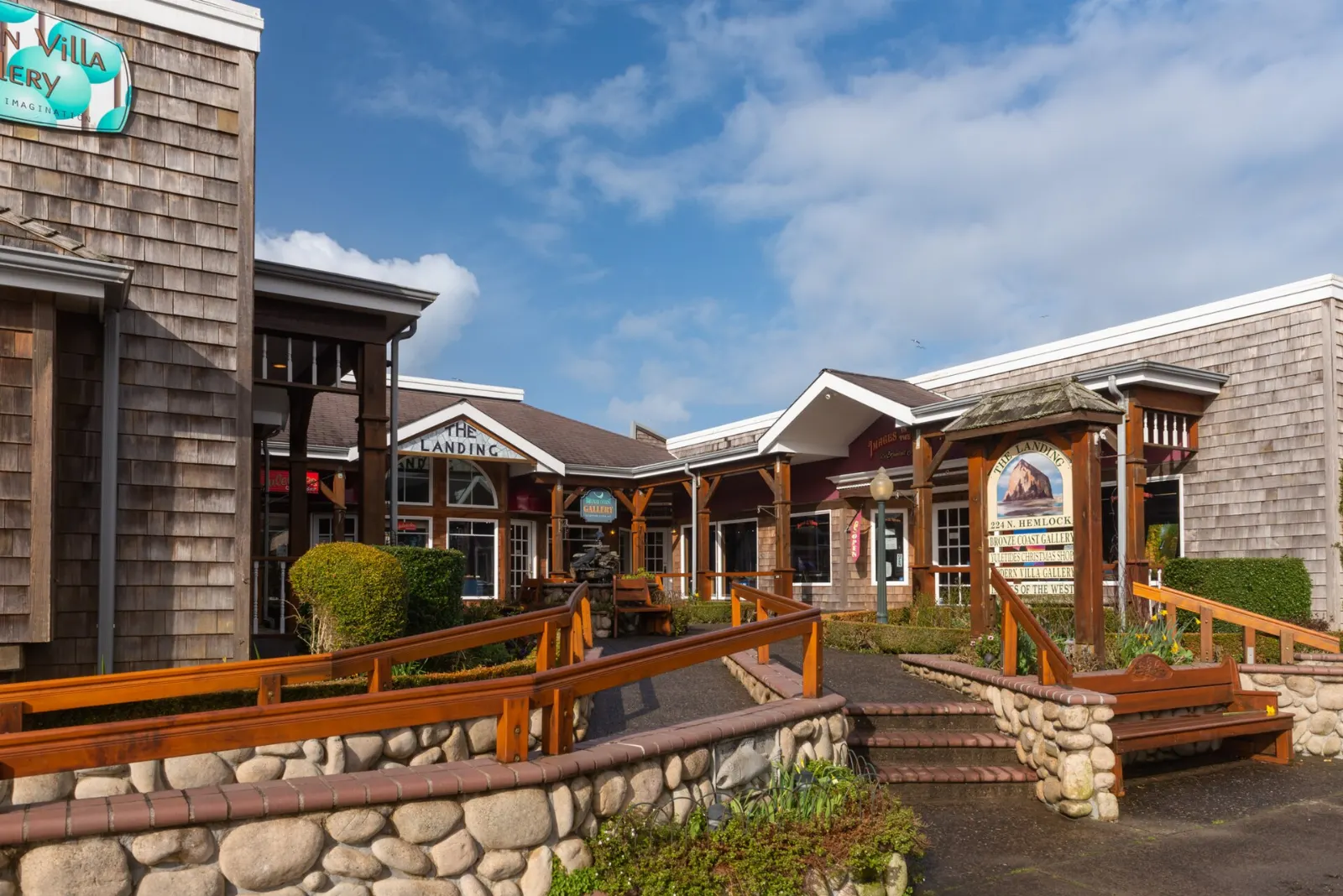 Shingled shops and flower boxes along the main street of Cannon Beach, Oregon