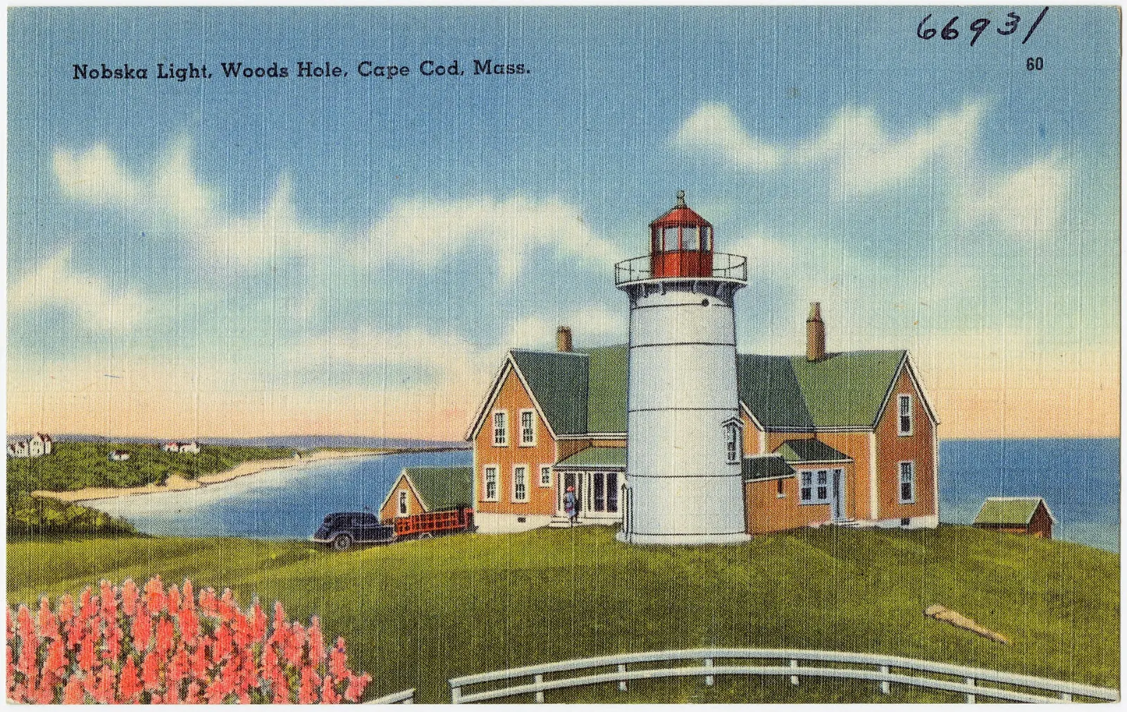The white Nobska Light tower on a rise above Vineyard Sound near Woods Hole, Cape Cod, Massachusetts