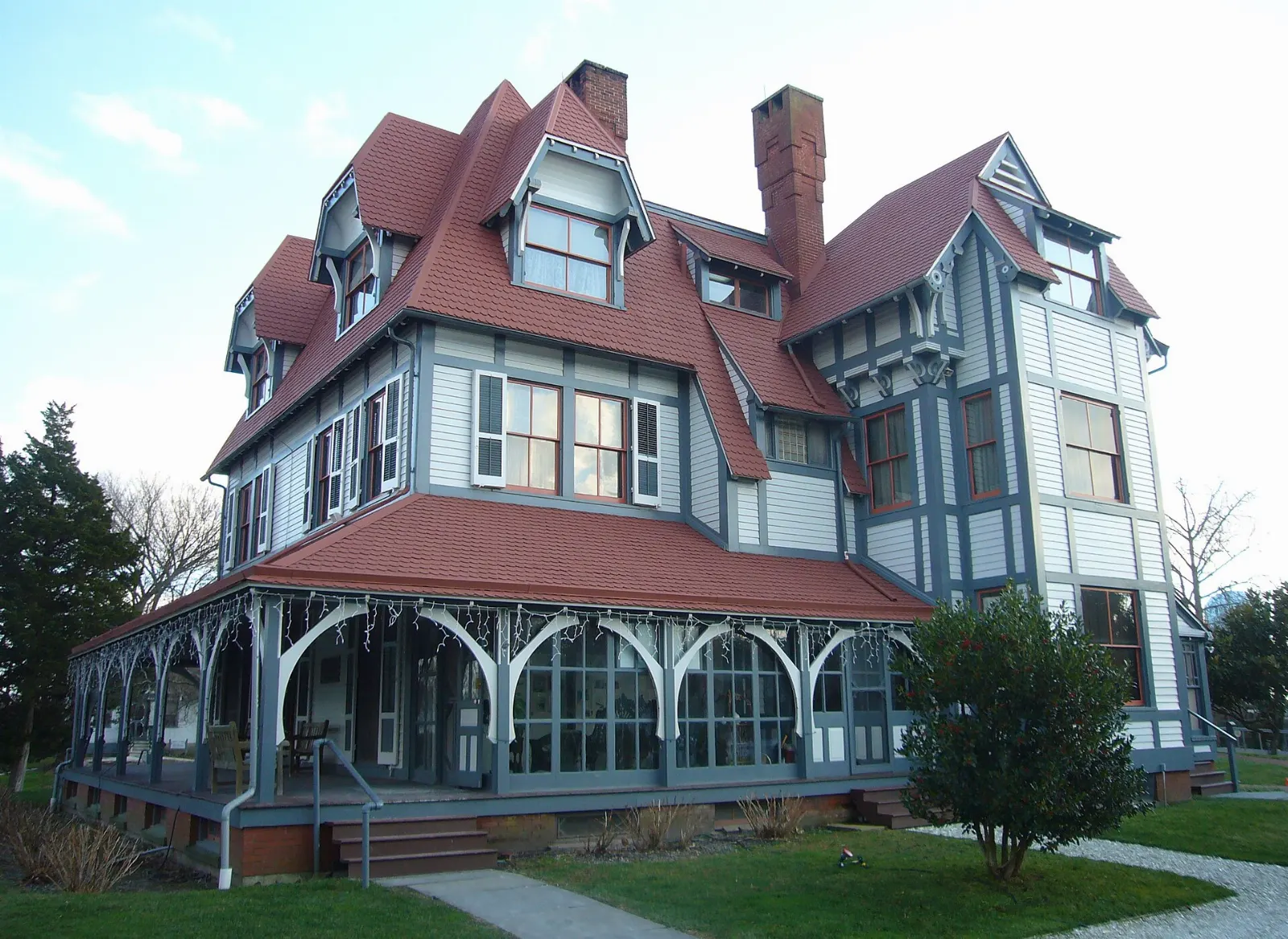A large Stick style Victorian mansion with steep gables and tall chimneys, Cape May, New Jersey