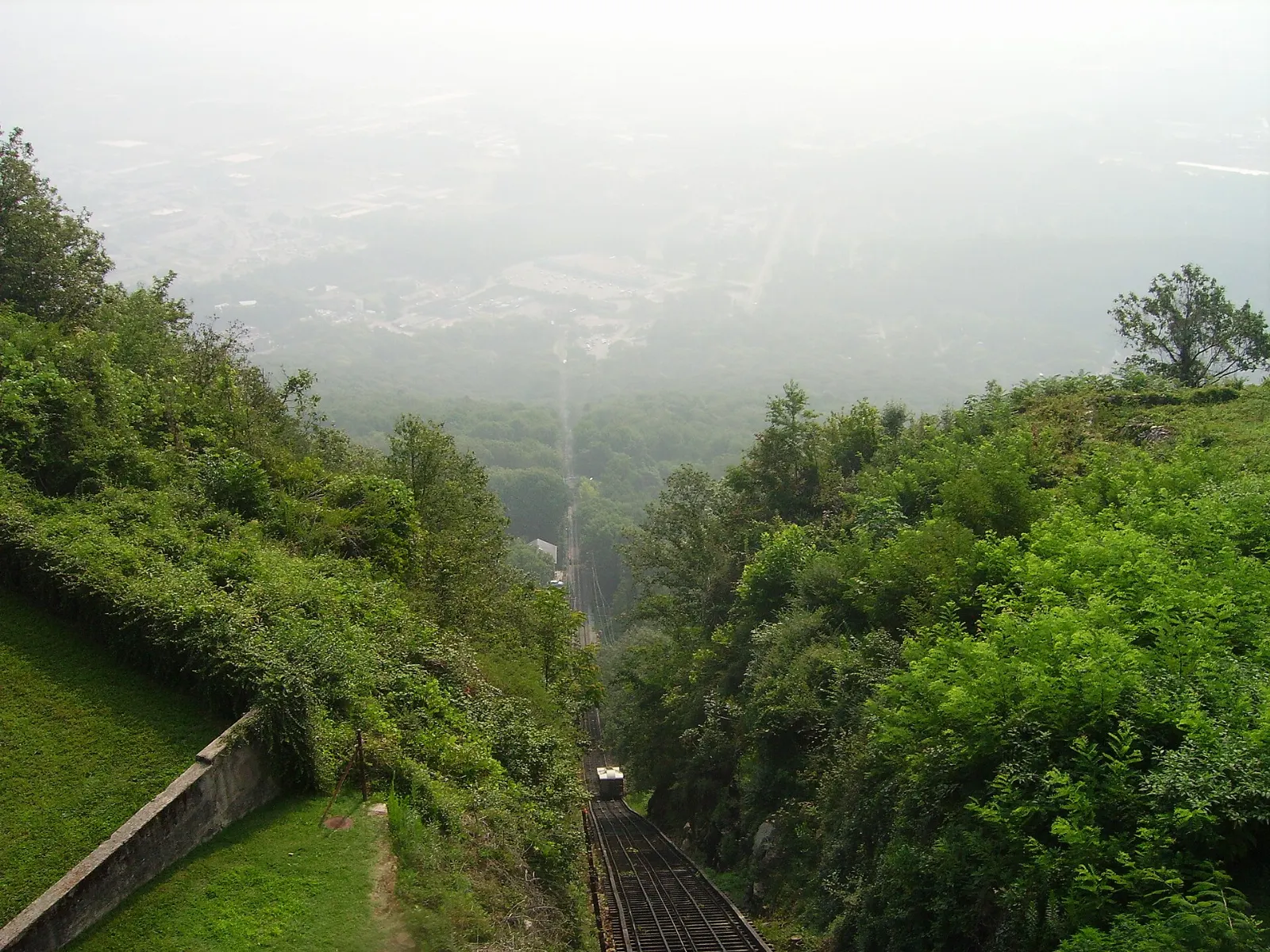 A red incline railway car climbing a steep track up Lookout Mountain, Chattanooga, Tennessee