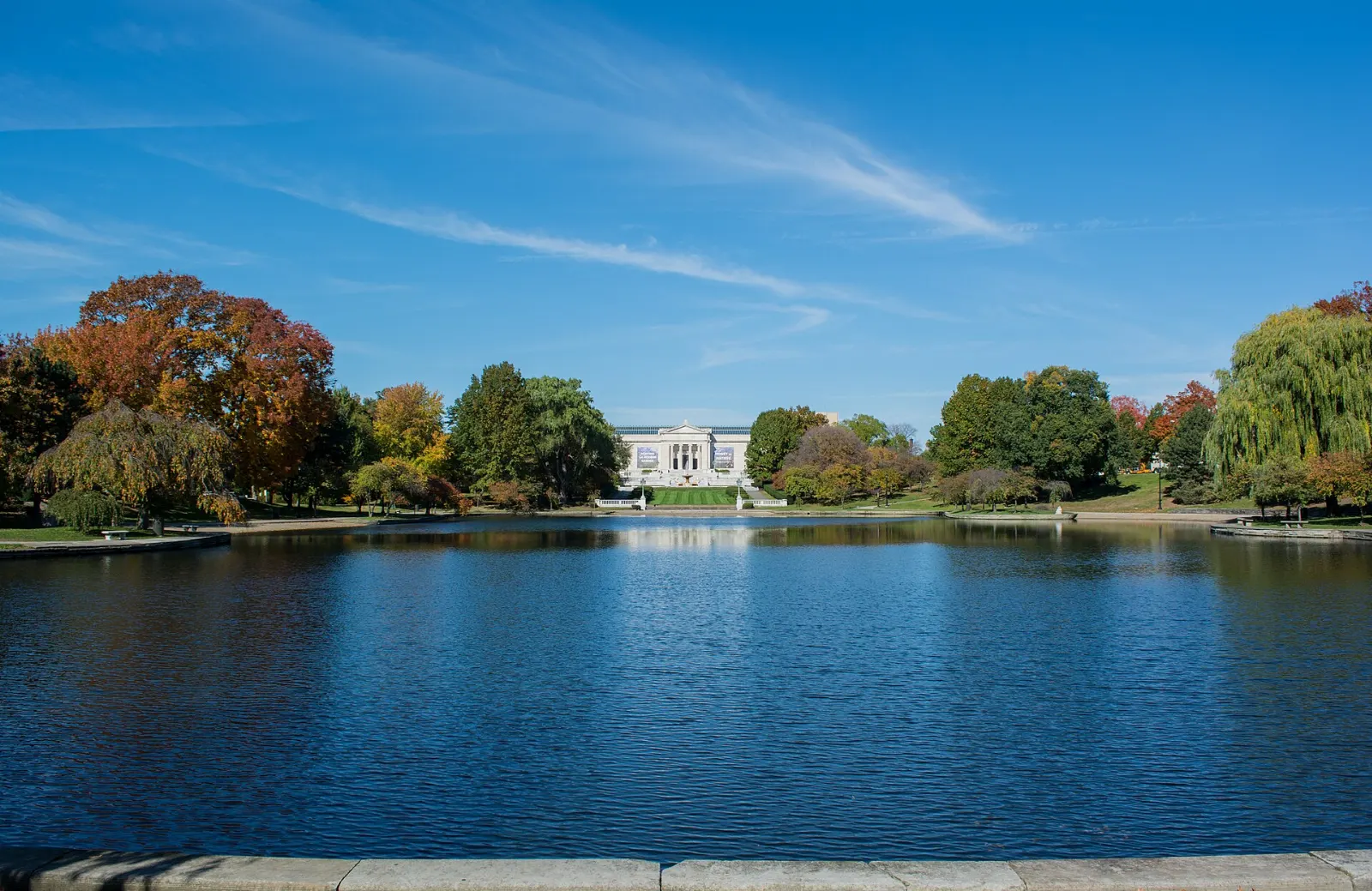 The neoclassical facade of the Cleveland Museum of Art above Wade Lagoon, Ohio