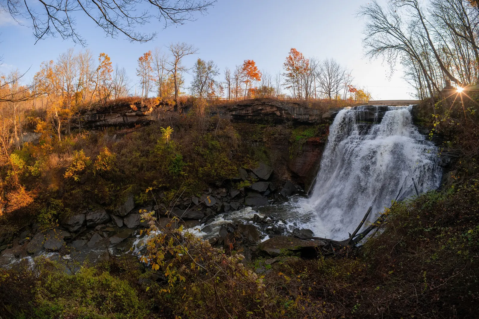 Brandywine Falls cascading over layered sandstone in a wooded gorge, Cleveland, Ohio