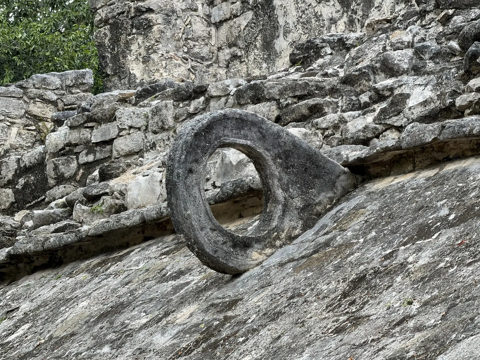 The remains of a Maya ball court among the trees at Cobá, Quintana Roo