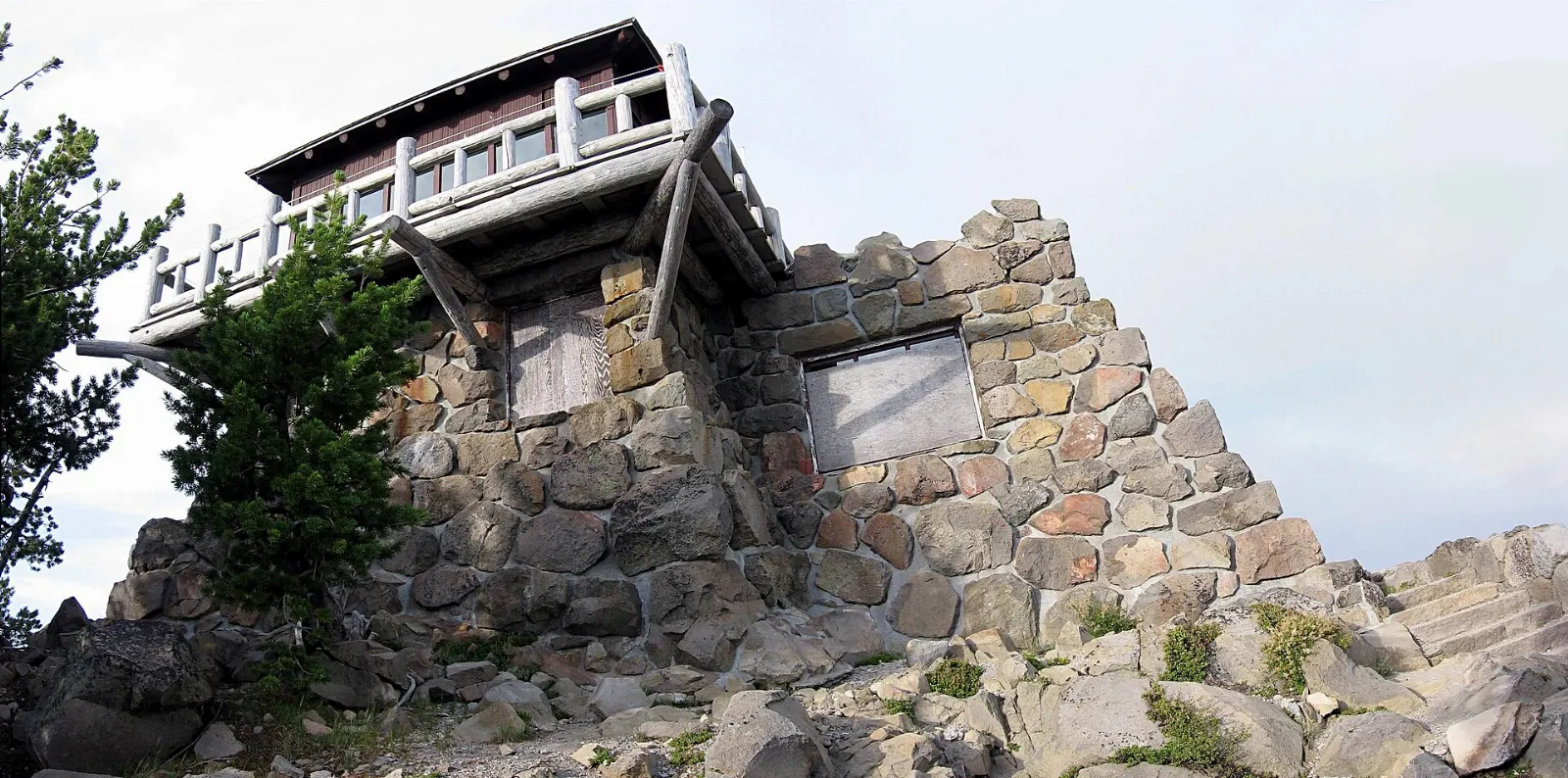 The stone fire lookout on the summit of Watchman Peak overlooking Crater Lake, Crater Lake National Park, Oregon