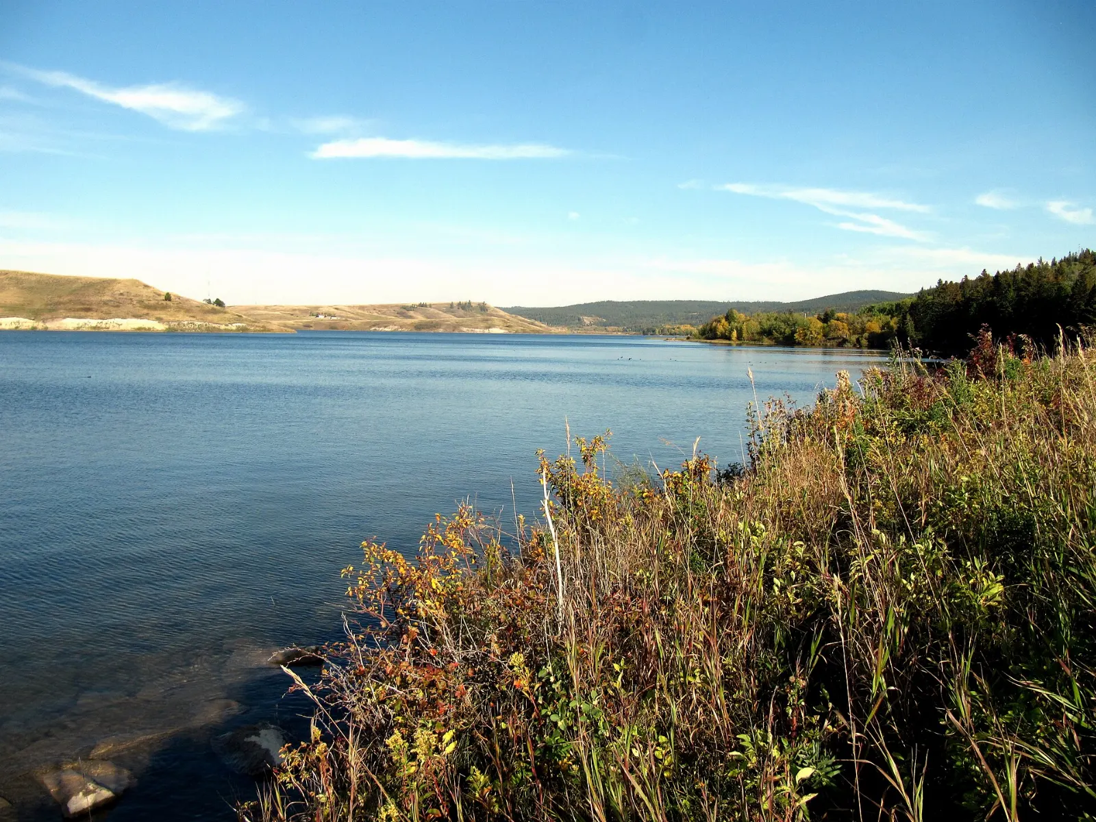 Elkwater Lake surrounded by forested slopes, Cypress Hills Interprovincial Park, Saskatchewan