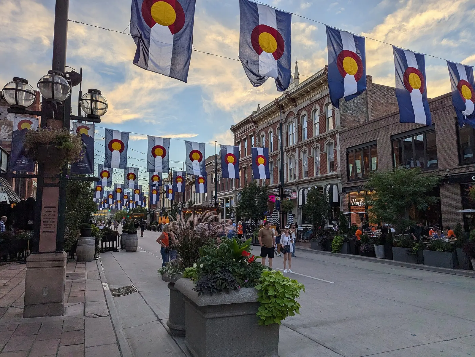 Strings of lights hanging over the historic brick buildings of Larimer Square, Denver, Colorado