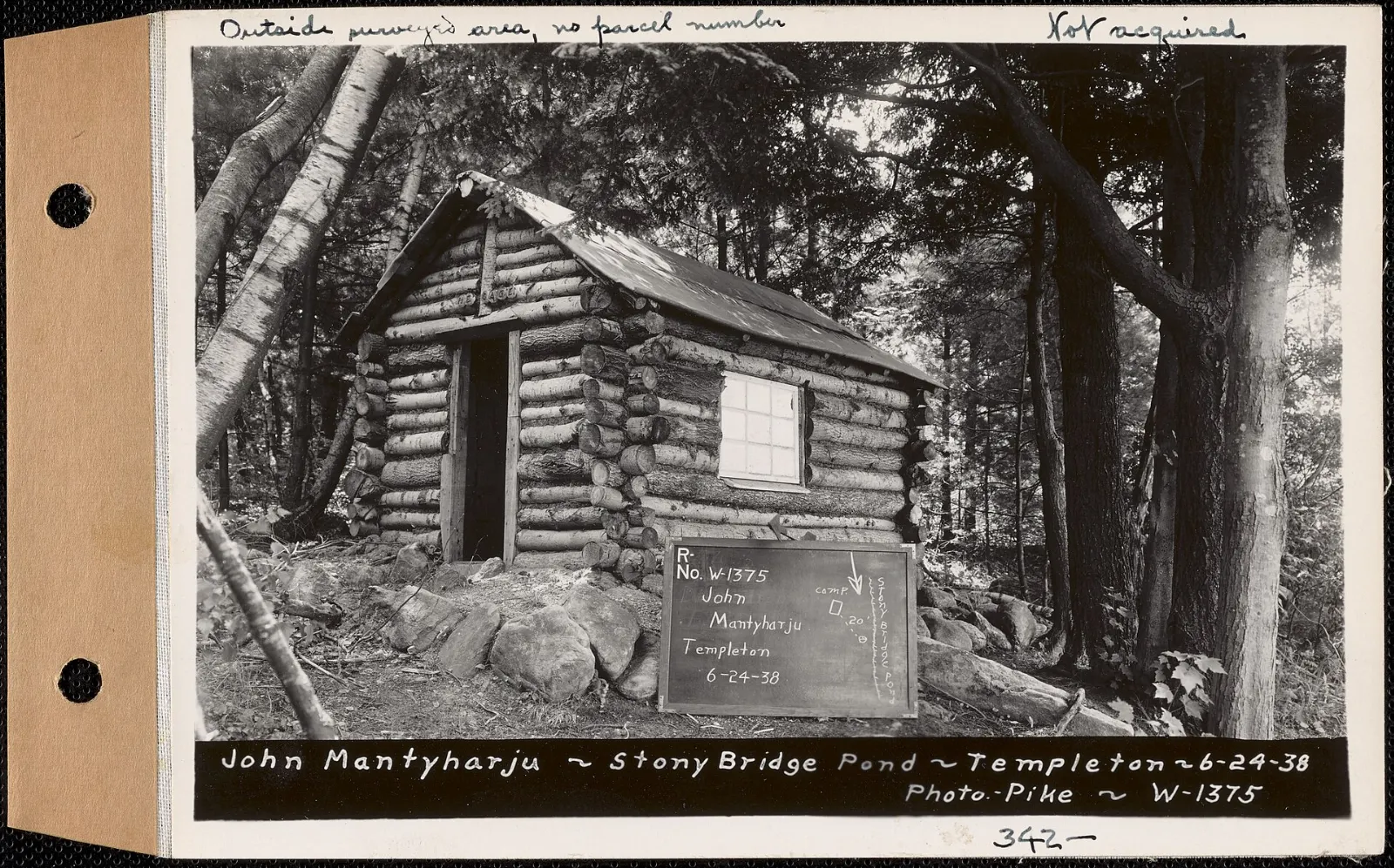 Restored log cabin once used by cowboy John Ware, Dinosaur Provincial Park, Alberta