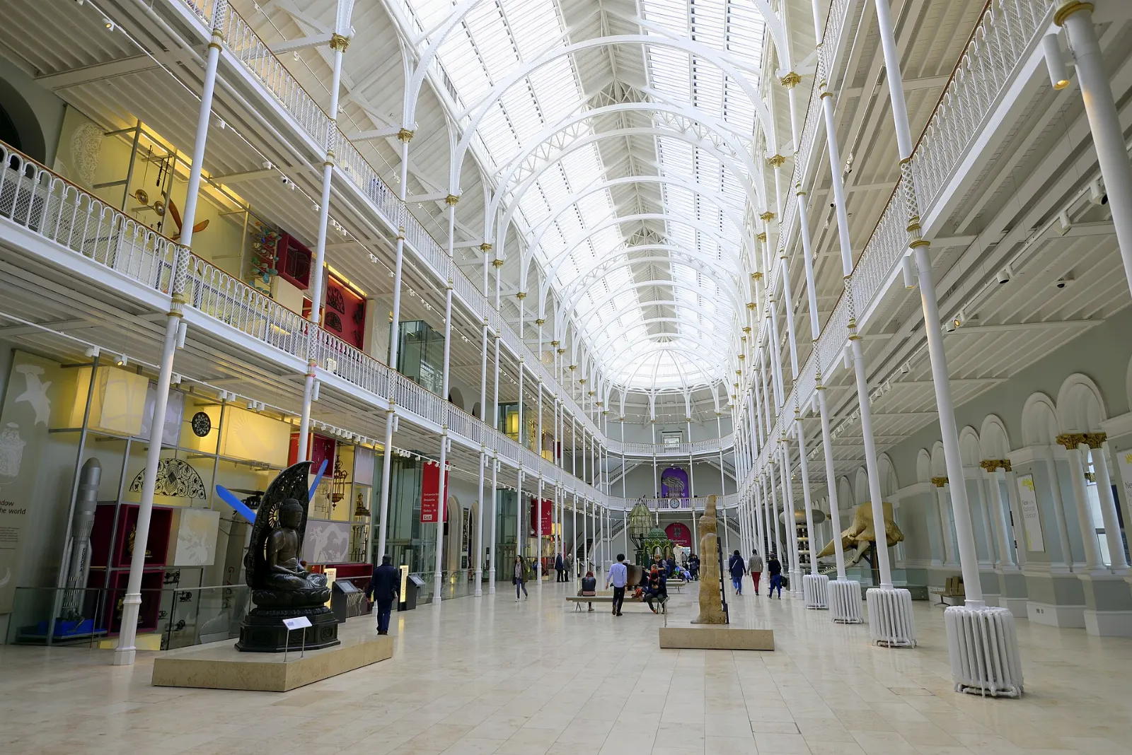 Bright main hall of the National Museum of Scotland with its iron galleries, Edinburgh, Scotland