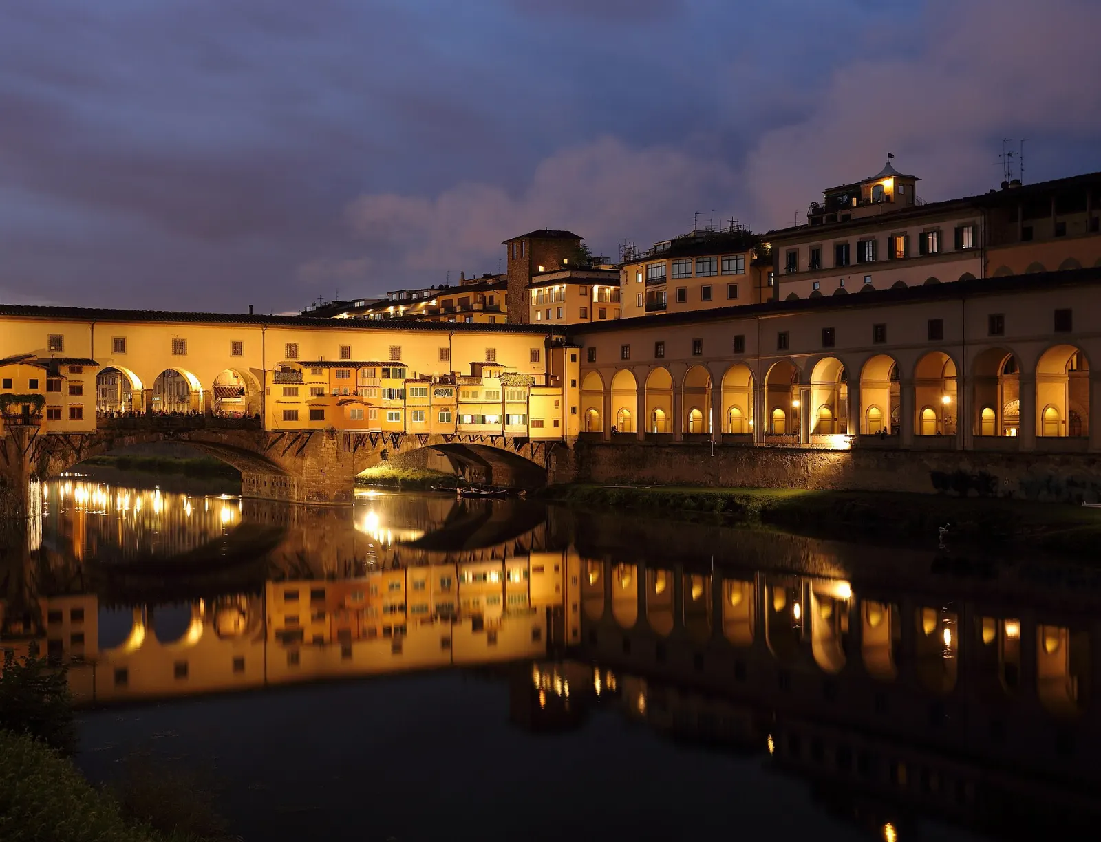 The Ponte Vecchio with shops built along both sides of the bridge over the Arno, Florence, Italy