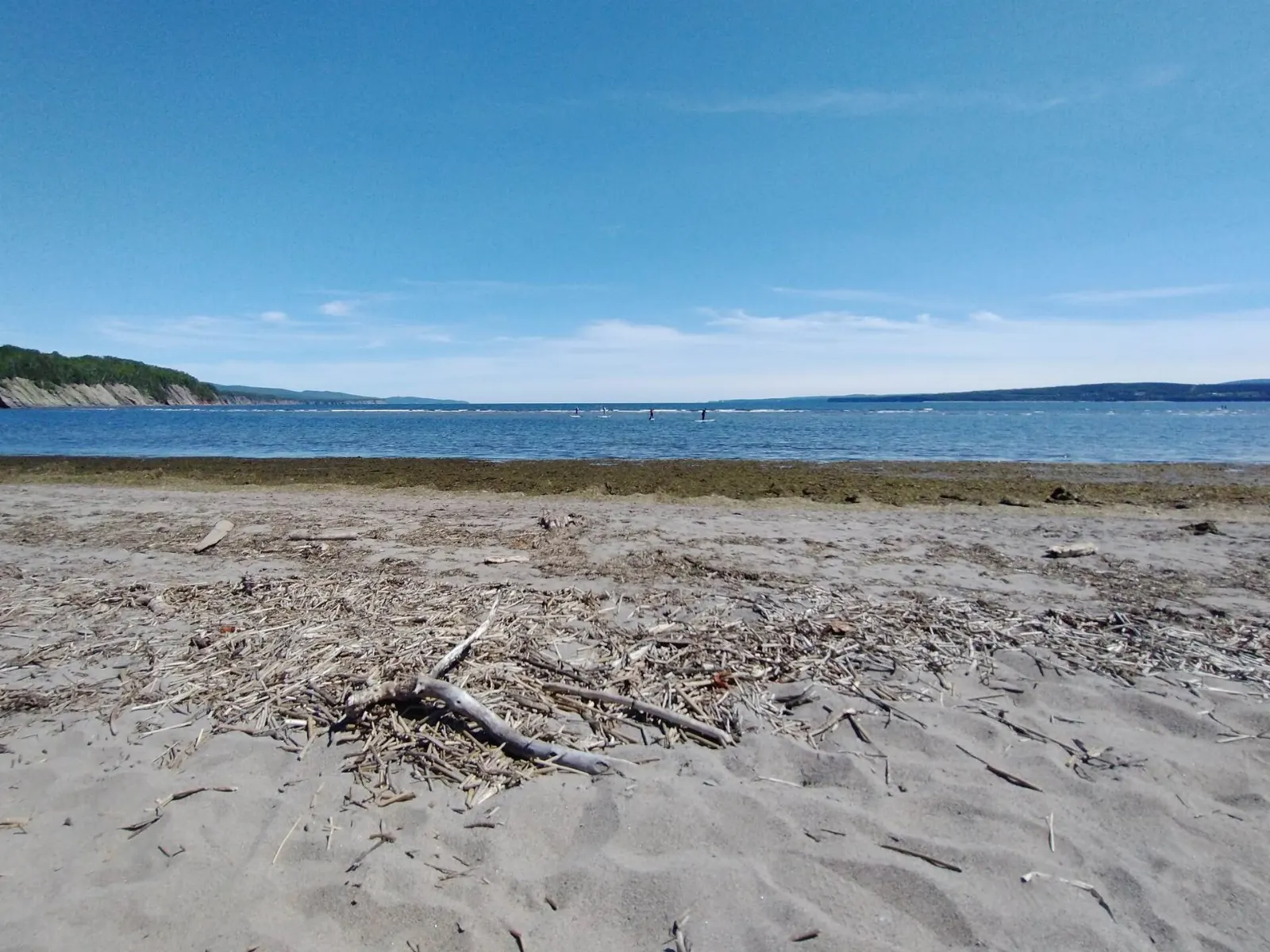Sand spit and calm shallow water at La Penouille in Forillon National Park, Quebec