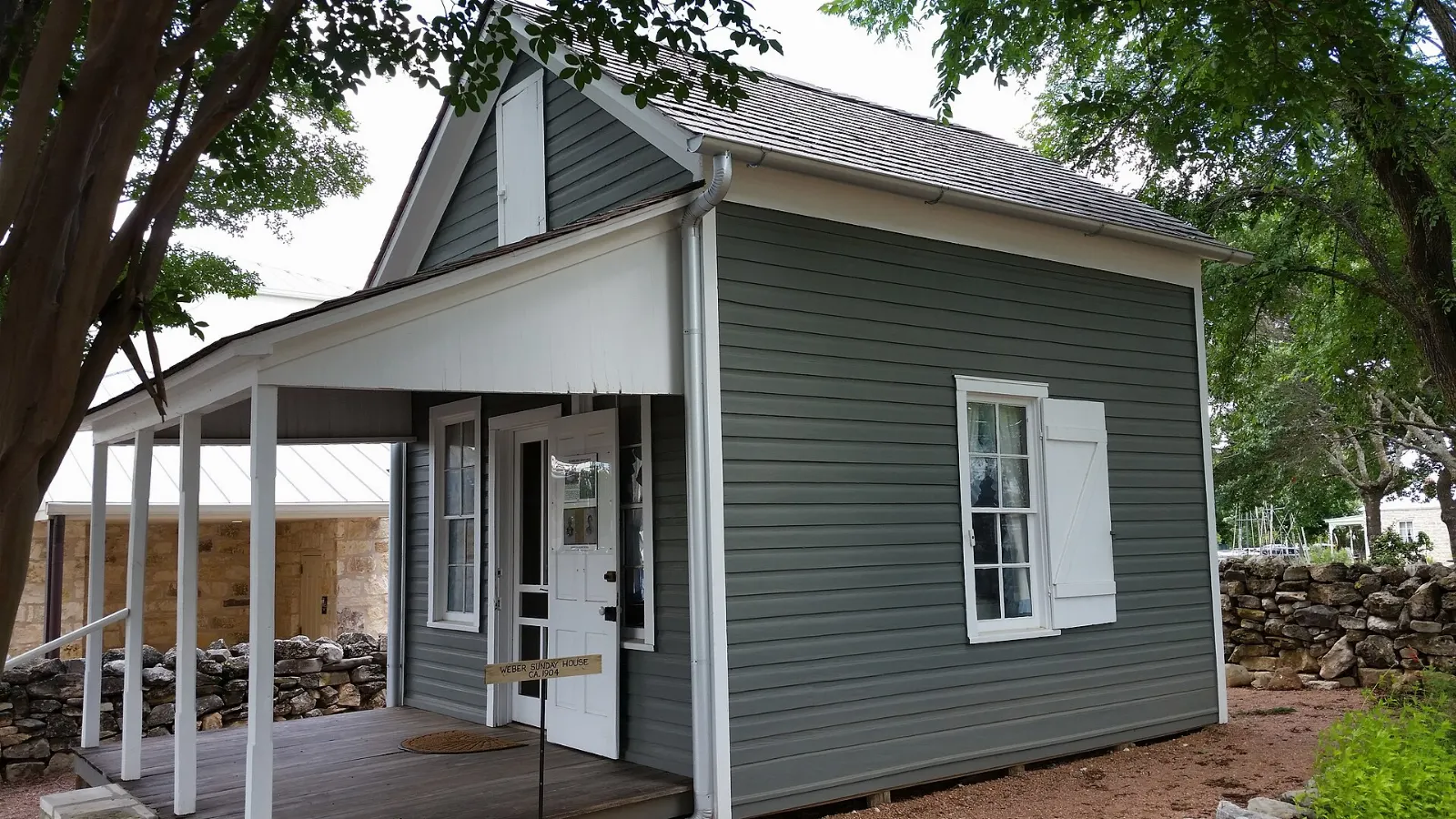 Historic stone house and outbuildings at the Pioneer Museum in Fredericksburg, Texas