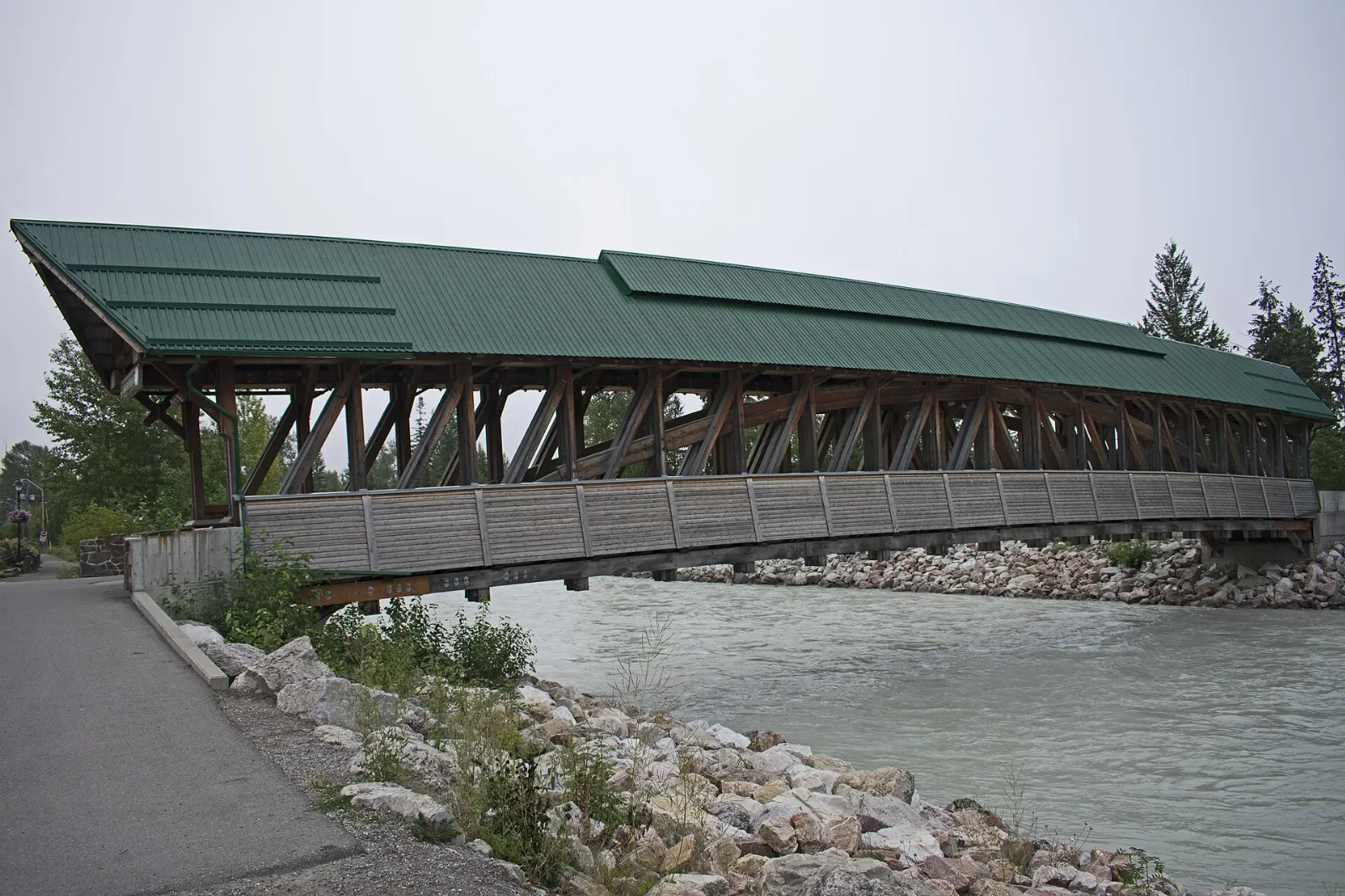 The covered timber-frame Kicking Horse Pedestrian Bridge in Golden, British Columbia