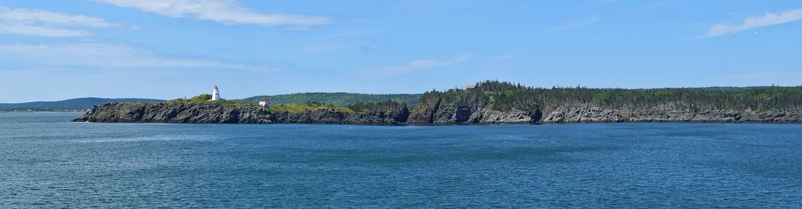 Swallowtail Lighthouse on its headland at North Head, Grand Manan Island, New Brunswick