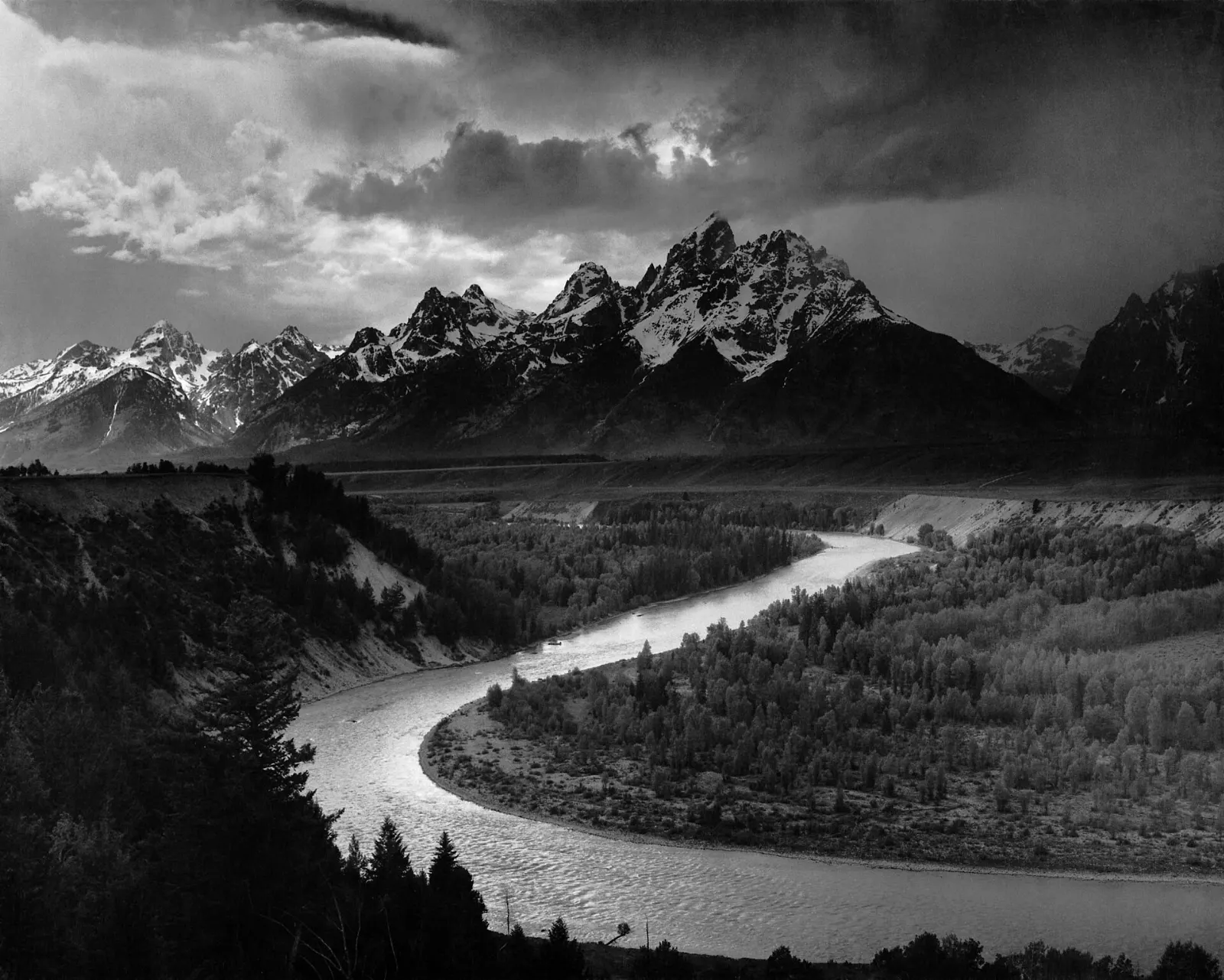 The Teton Range reflected in a still beaver pond at Schwabacher Landing, Grand Teton National Park, Wyoming