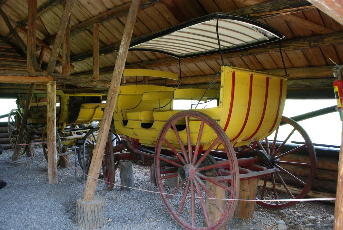 A wooden cable ferry beside the Snake River with mountains in the background, Grand Teton National Park, Wyoming