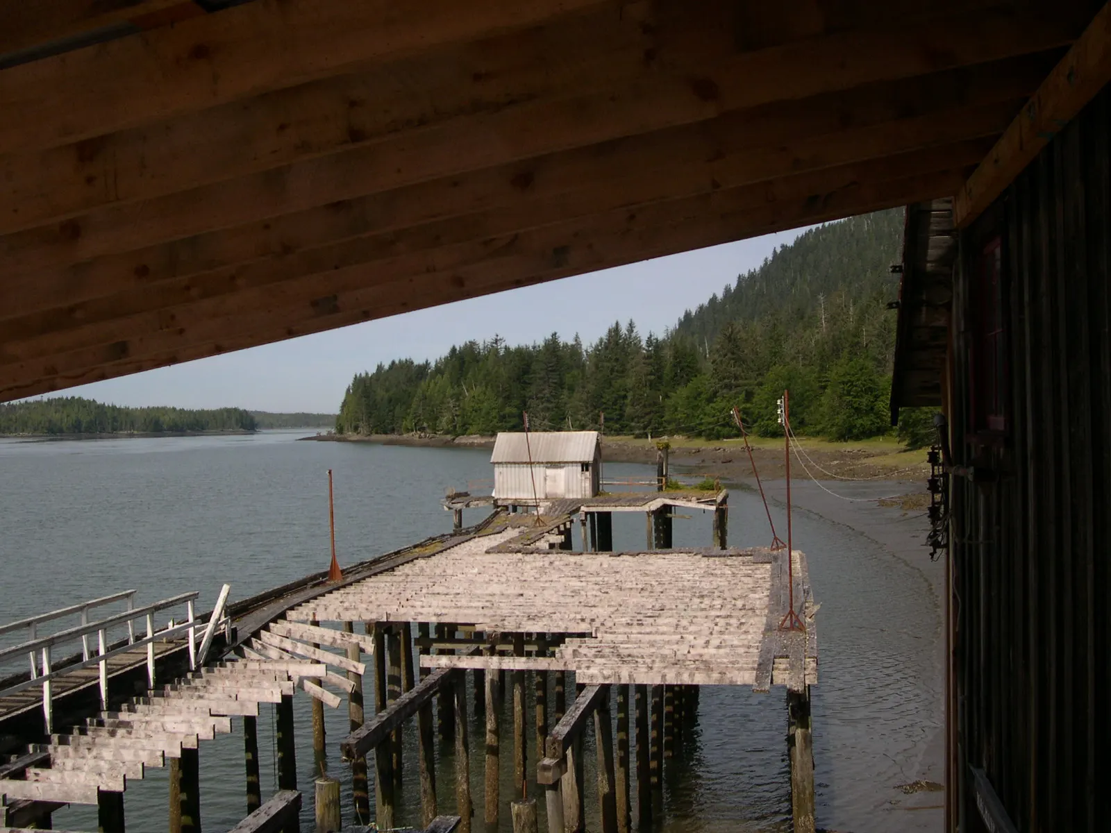 Weathered cannery buildings on pilings at Port Edward, Great Bear Rainforest, British Columbia
