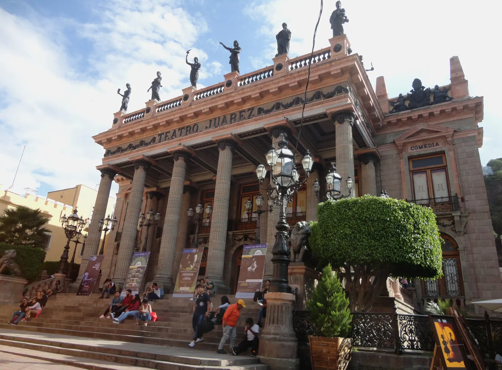 The columned facade of Teatro Juárez with bronze figures along the roofline, Guanajuato City, Guanajuato
