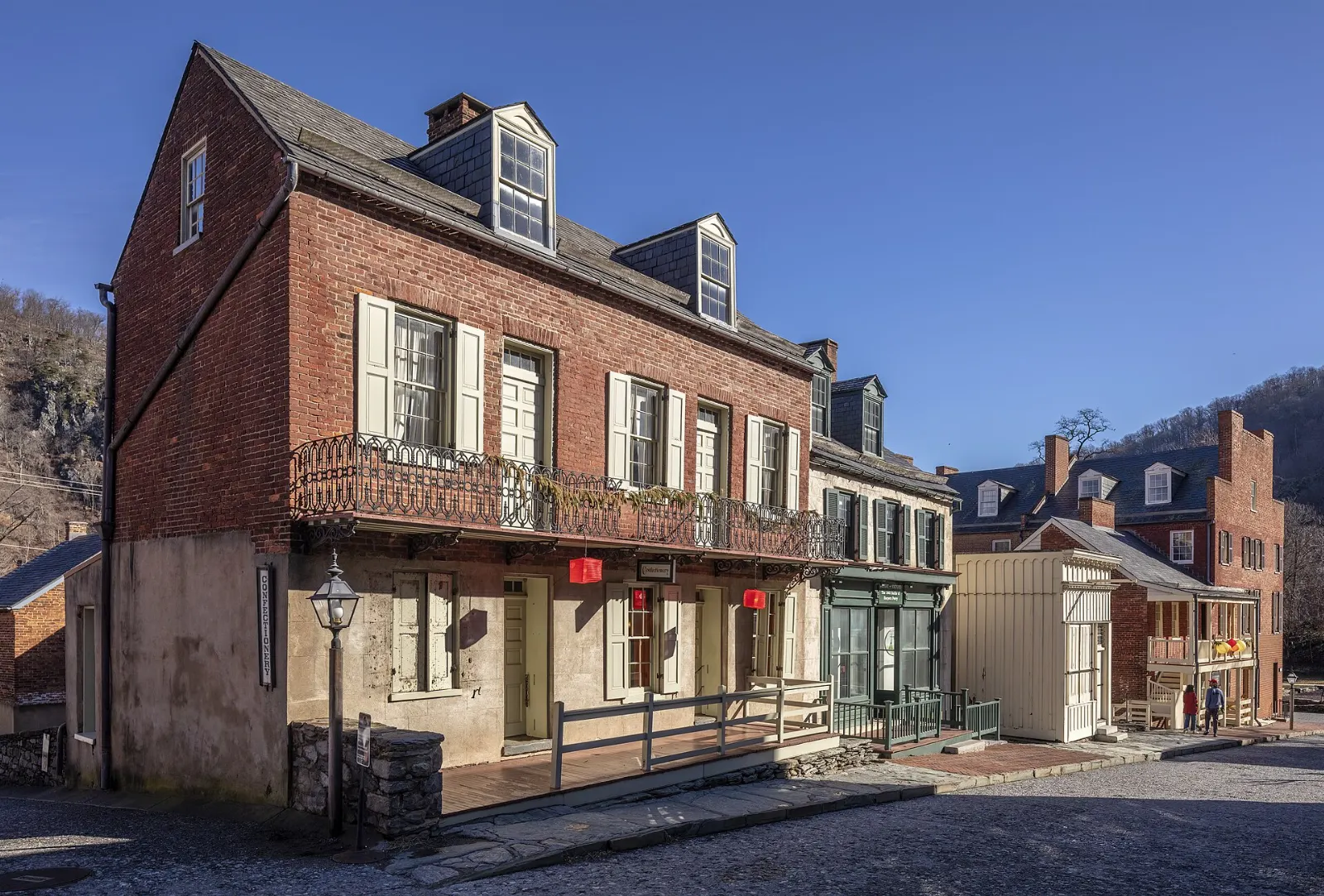 Restored nineteenth-century brick and stone buildings along Shenandoah Street in Lower Town, Harpers Ferry, West Virginia