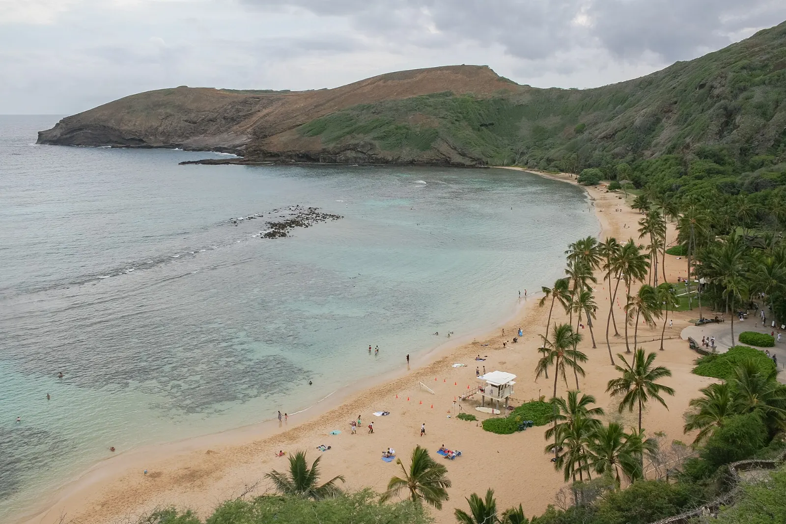 Curved reef-lined bay of Hanauma seen from the crater rim, Honolulu, Hawaii