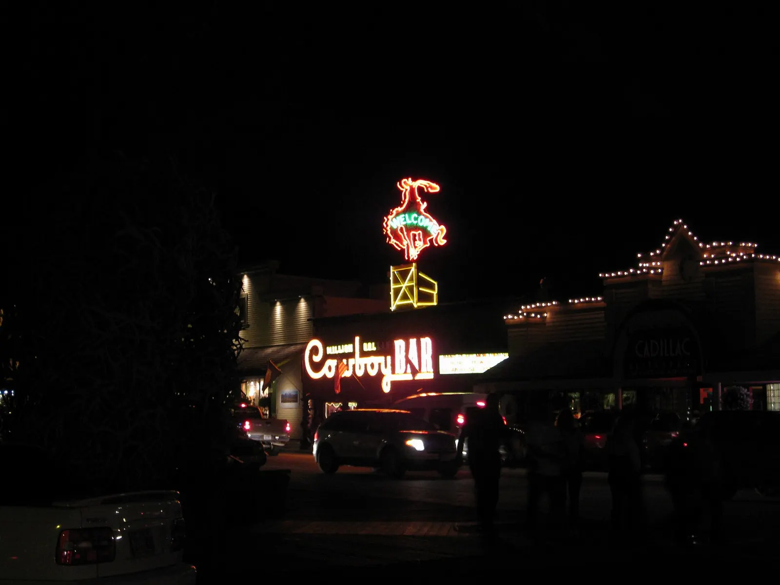 The neon cowboy sign above the entrance of the Million Dollar Cowboy Bar, Jackson Hole, Wyoming