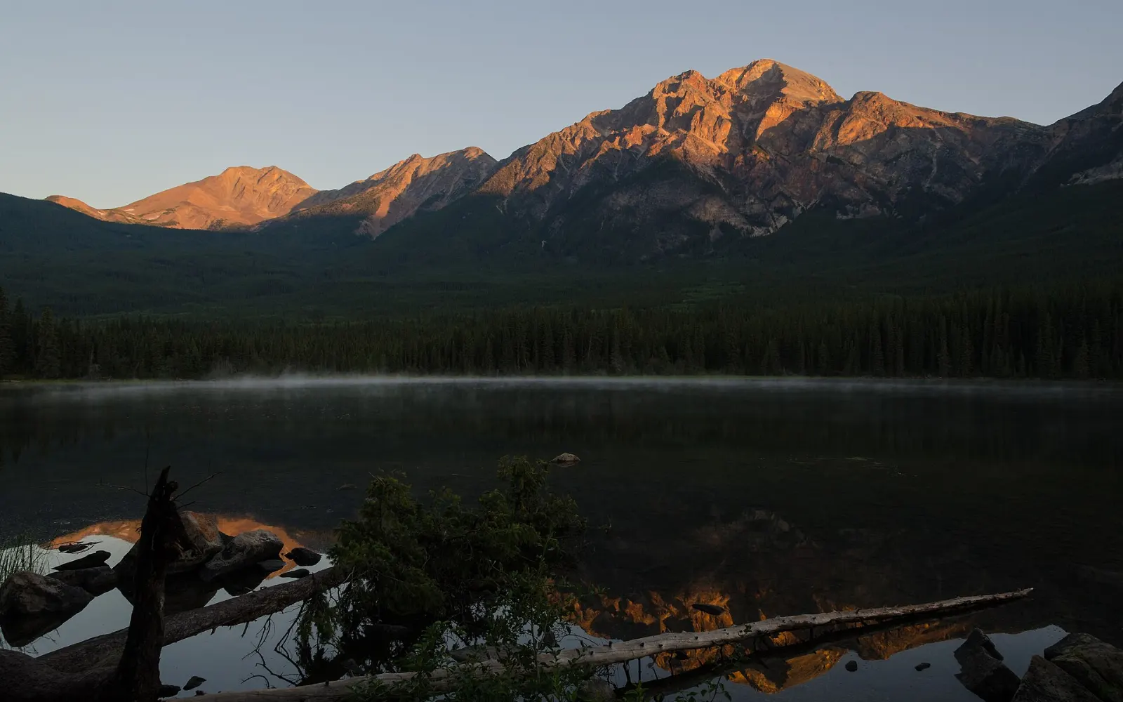 Pyramid Mountain reflected in the still water of Pyramid Lake, Jasper National Park, Alberta
