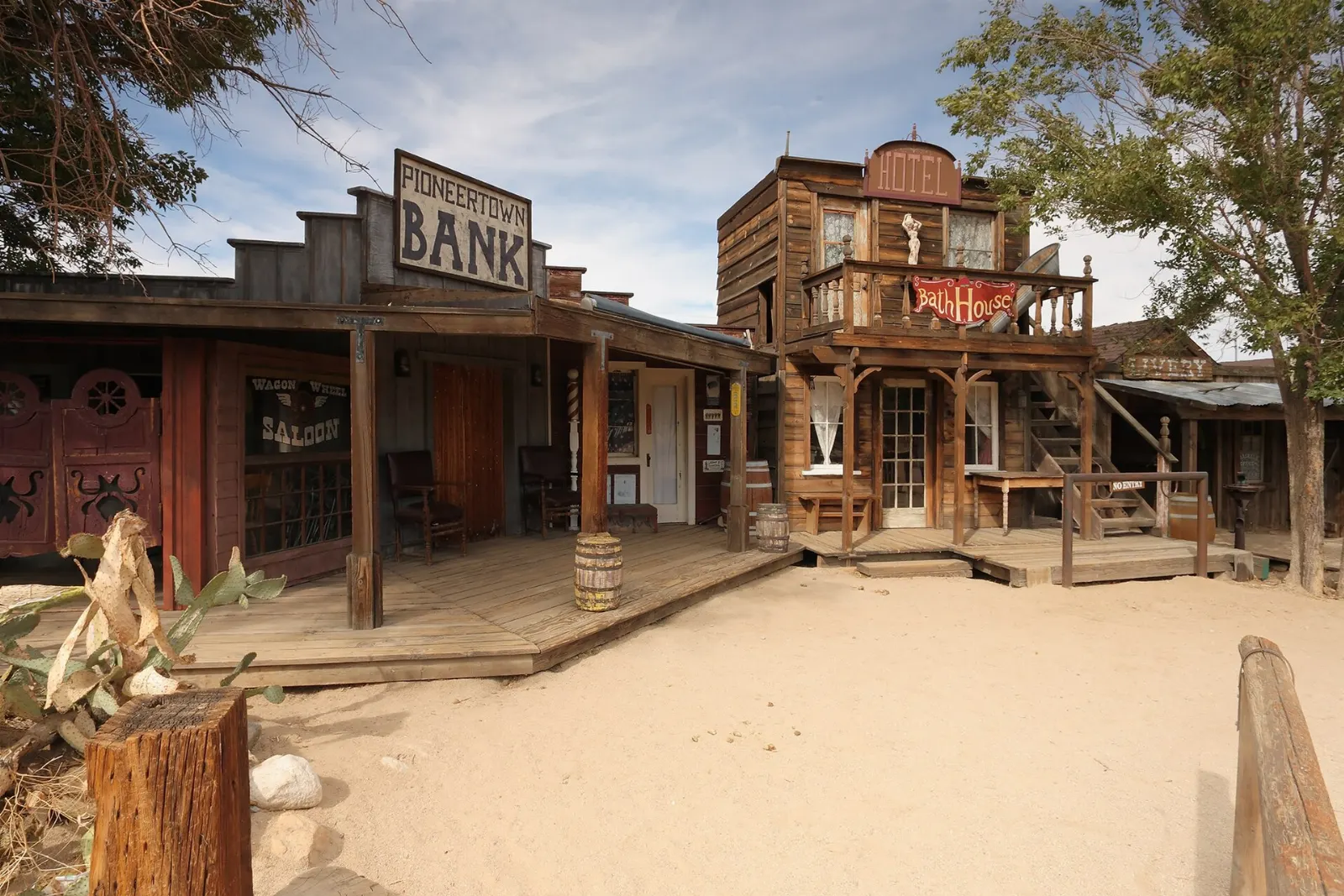 Wooden Old West storefronts along a dirt street in Pioneertown, Joshua Tree National Park, California