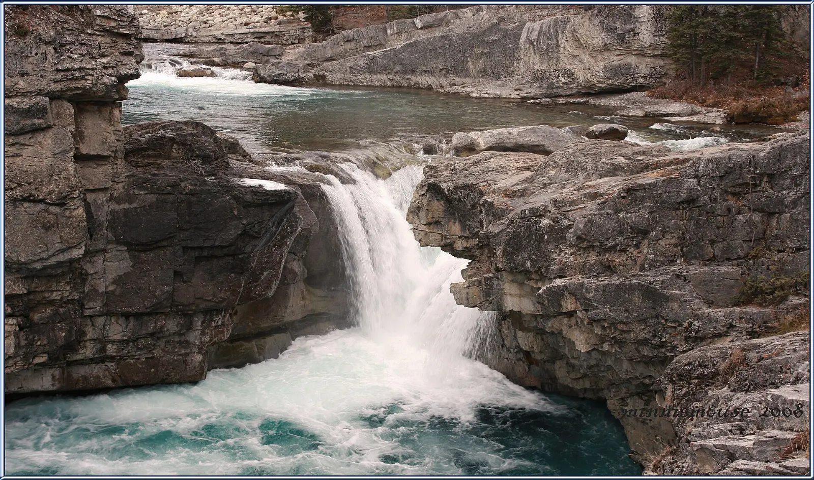 Water cascading at Elbow Falls on the Elbow River, Kananaskis Country, Alberta