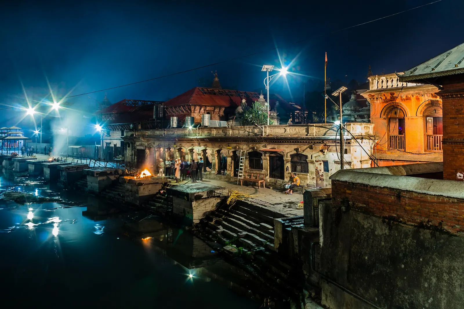Temple roofs and stone ghats along the Bagmati River at Pashupatinath, Kathmandu, Nepal