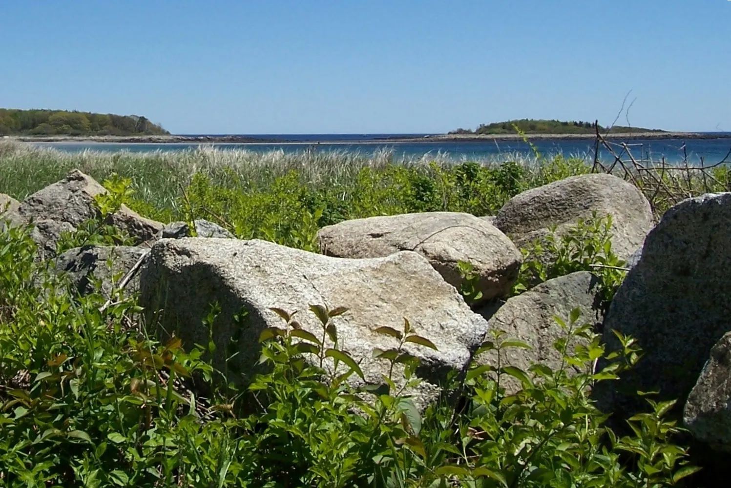 Long flat sandy beach at low tide at Goose Rocks in Kennebunkport, Maine