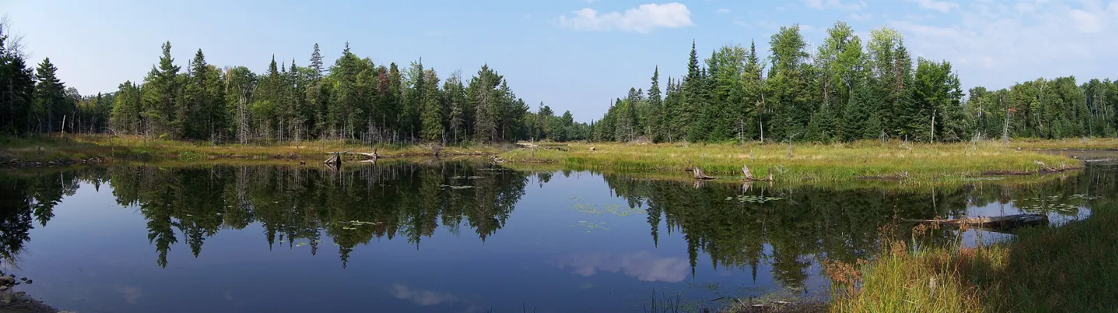 Canoe on a calm lake in Killarney Provincial Park, Ontario