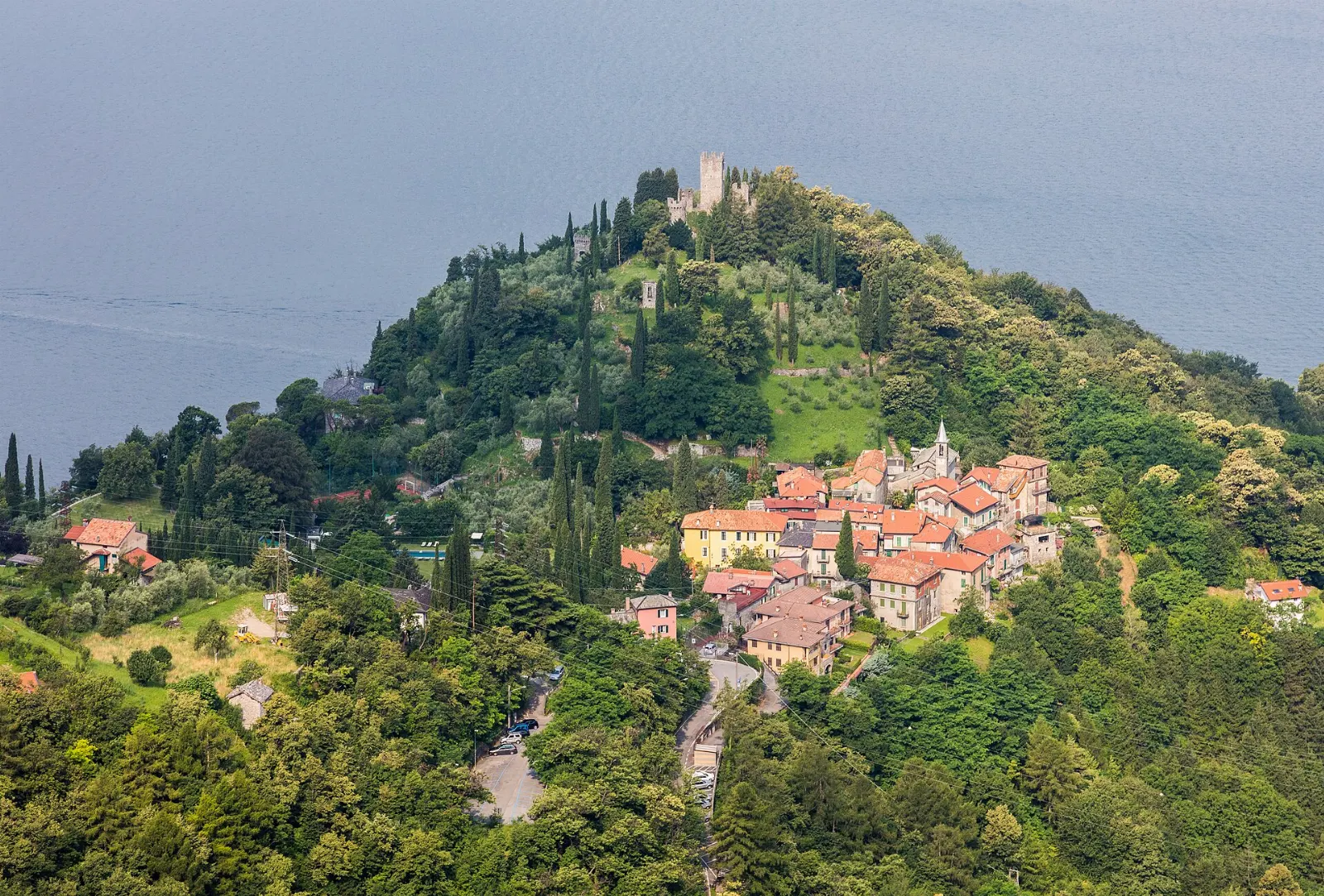 Stone tower of Castello di Vezio above Varenna and the lake, Lake Como, Italy