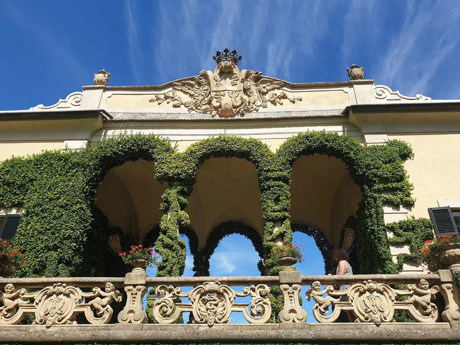 Villa del Balbianello with terraced gardens on a wooded point in Lake Como, Italy